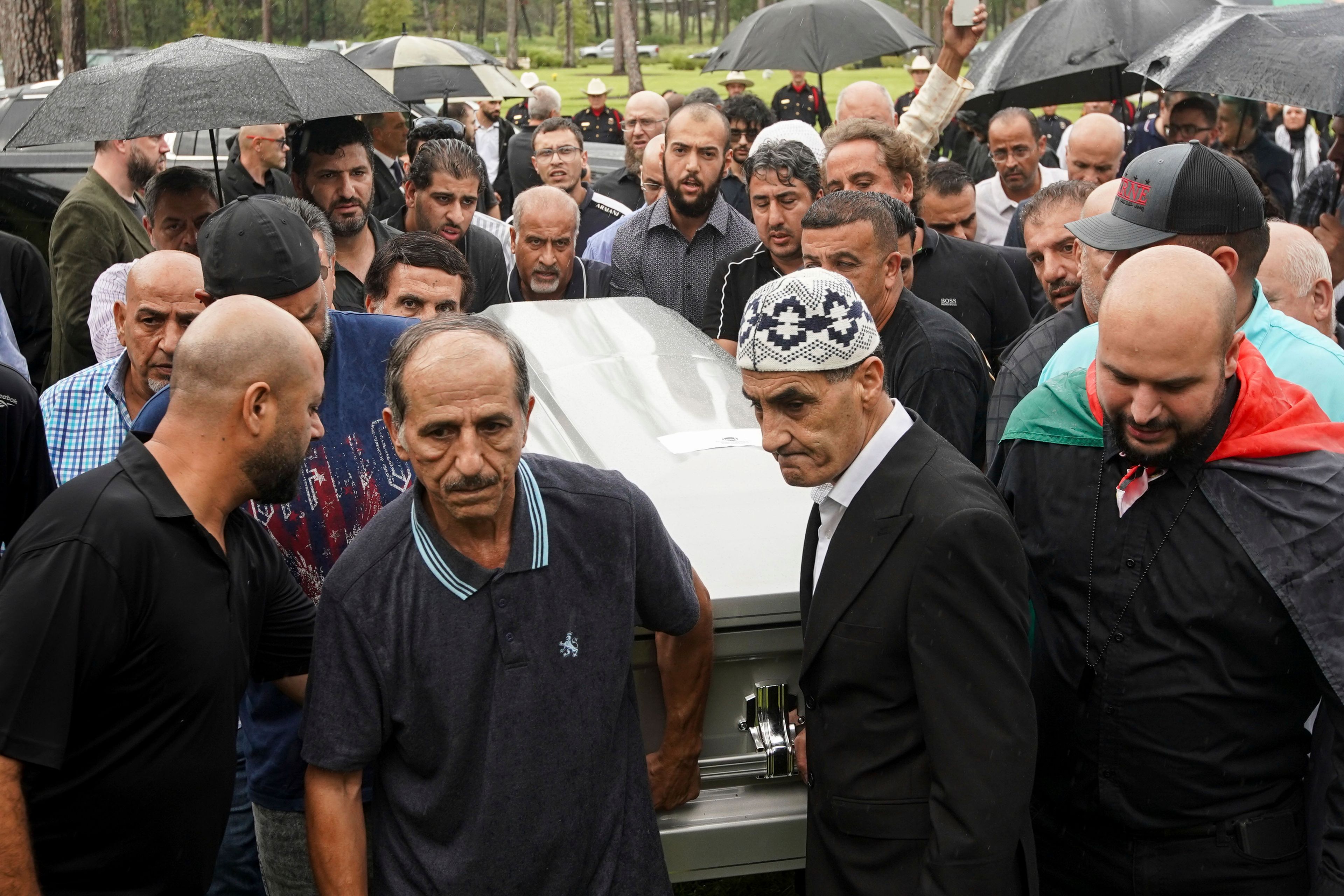 People carry the casket of slain Harris County Precinct 4 Deputy Constable Maher Husseini for burial Thursday, Sept. 5 2024, at Forest Park The Woodlands Funeral Home & Cemetery in The Woodlands, Texas.