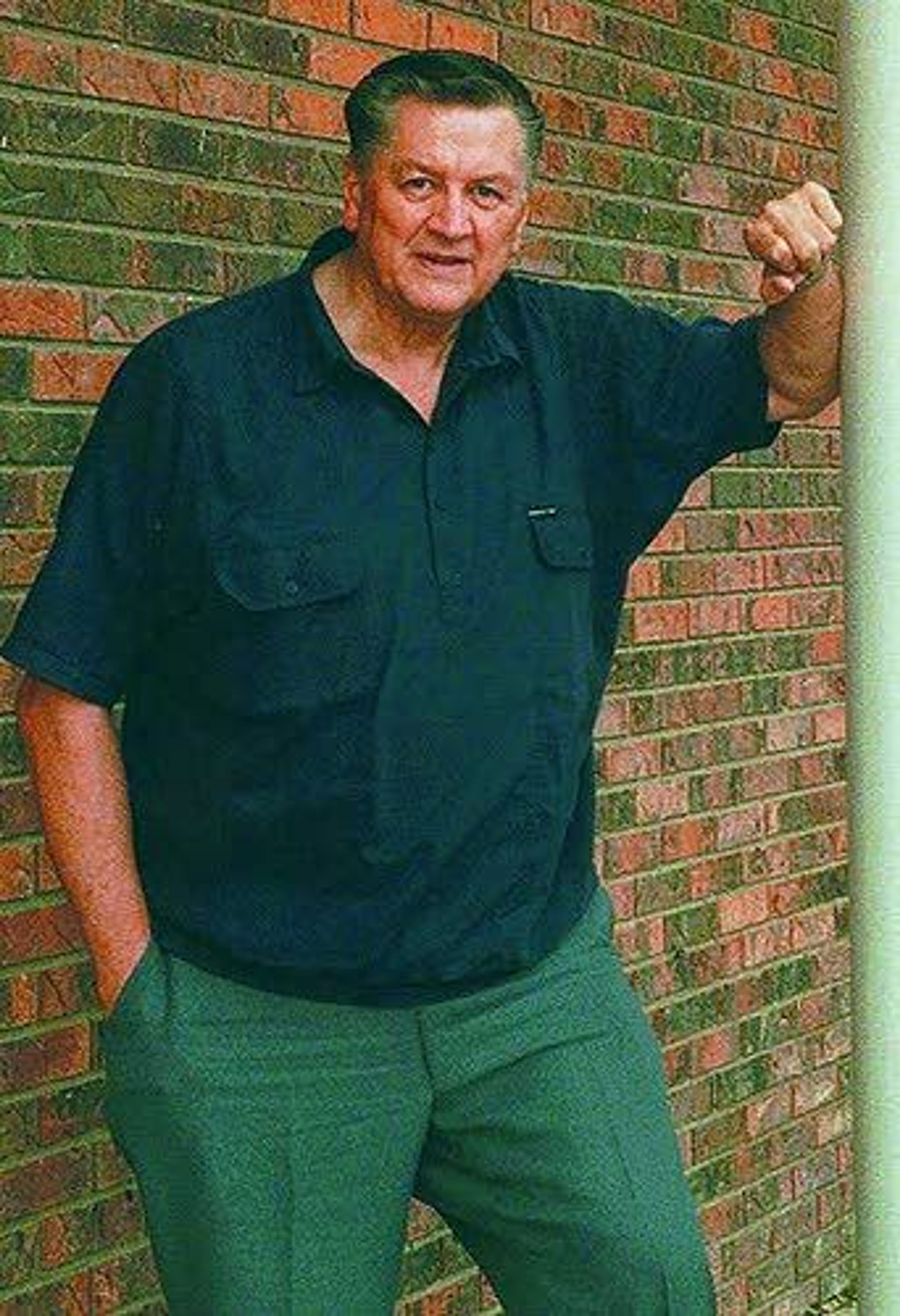 FILE - In this Nov. 20, 1997, file photo, former Congressman George Hansen poses for a photo, in Pocatello, Idaho. Hansen died Thursday, Aug. 14, 2014, of natural causes at a medical center in Pocatello, Cornelison Funeral Home said. He was 83. (AP Photo/Salt Lake Tribune, Christopher Smith, File)