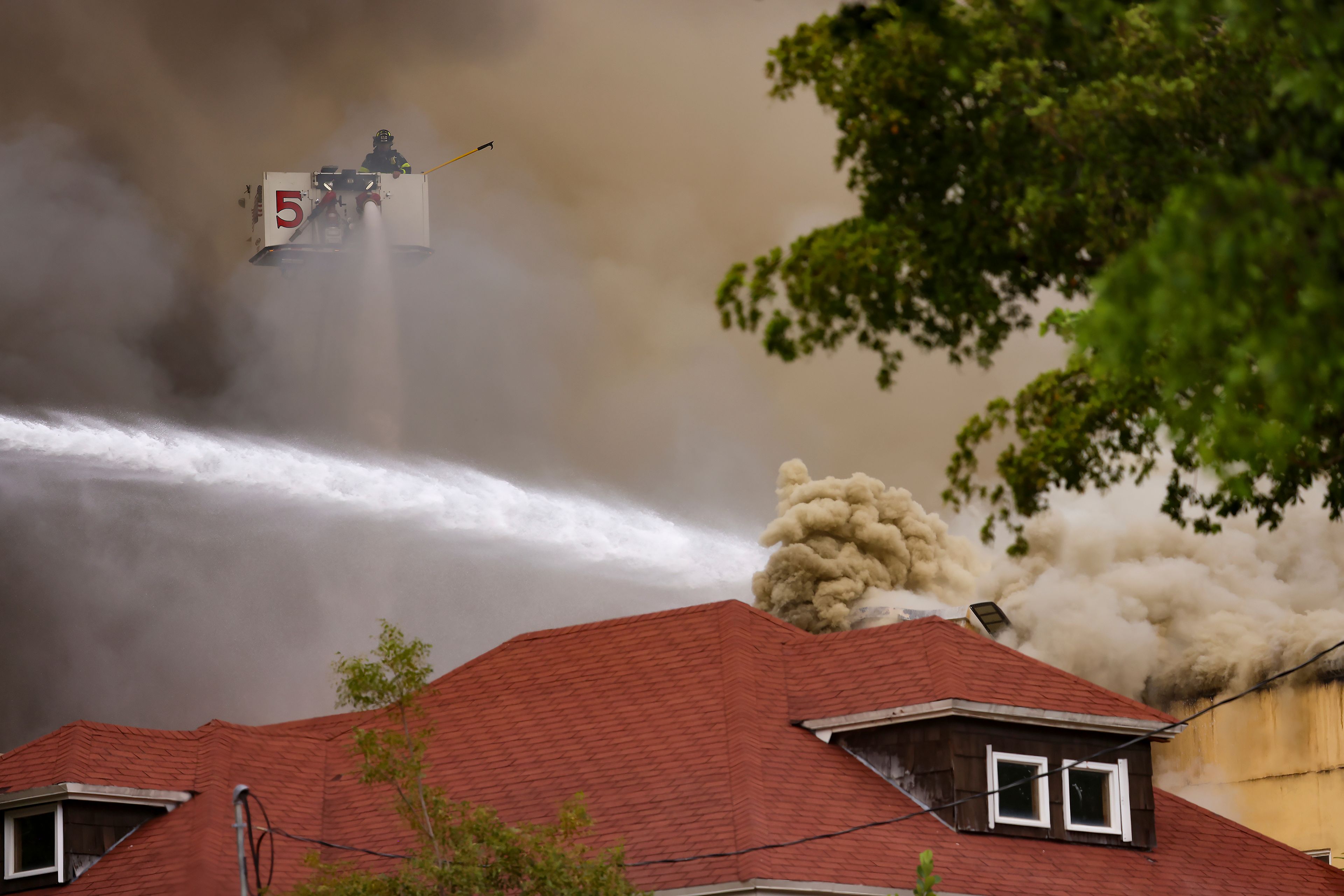 Miami Fire Rescue and Miami police working at the scene of the fire at the Temple Court Apartments, Monday, June 10, 2024 in Miami.