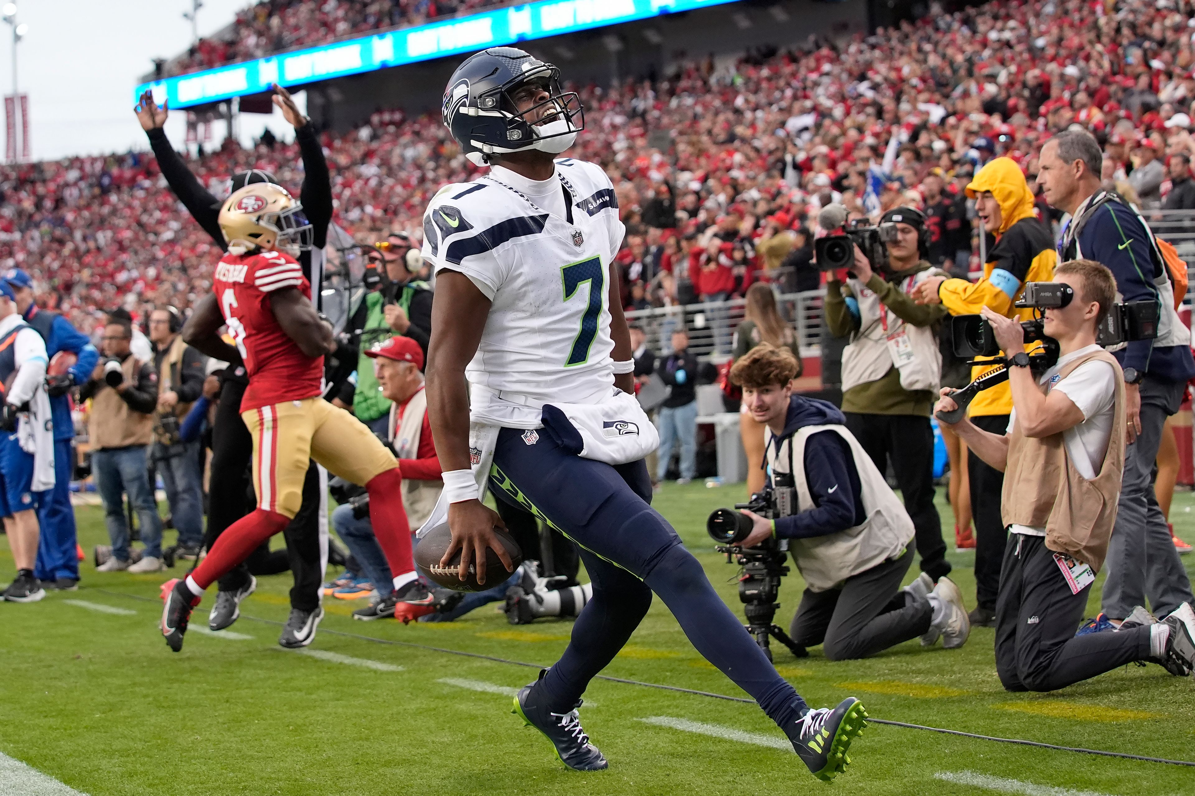 Seattle Seahawks quarterback Geno Smith (7) reacts after scoring against the San Francisco 49ers during the second half of an NFL football game Sunday, Nov. 17, 2024. in Santa Clara, Calif.