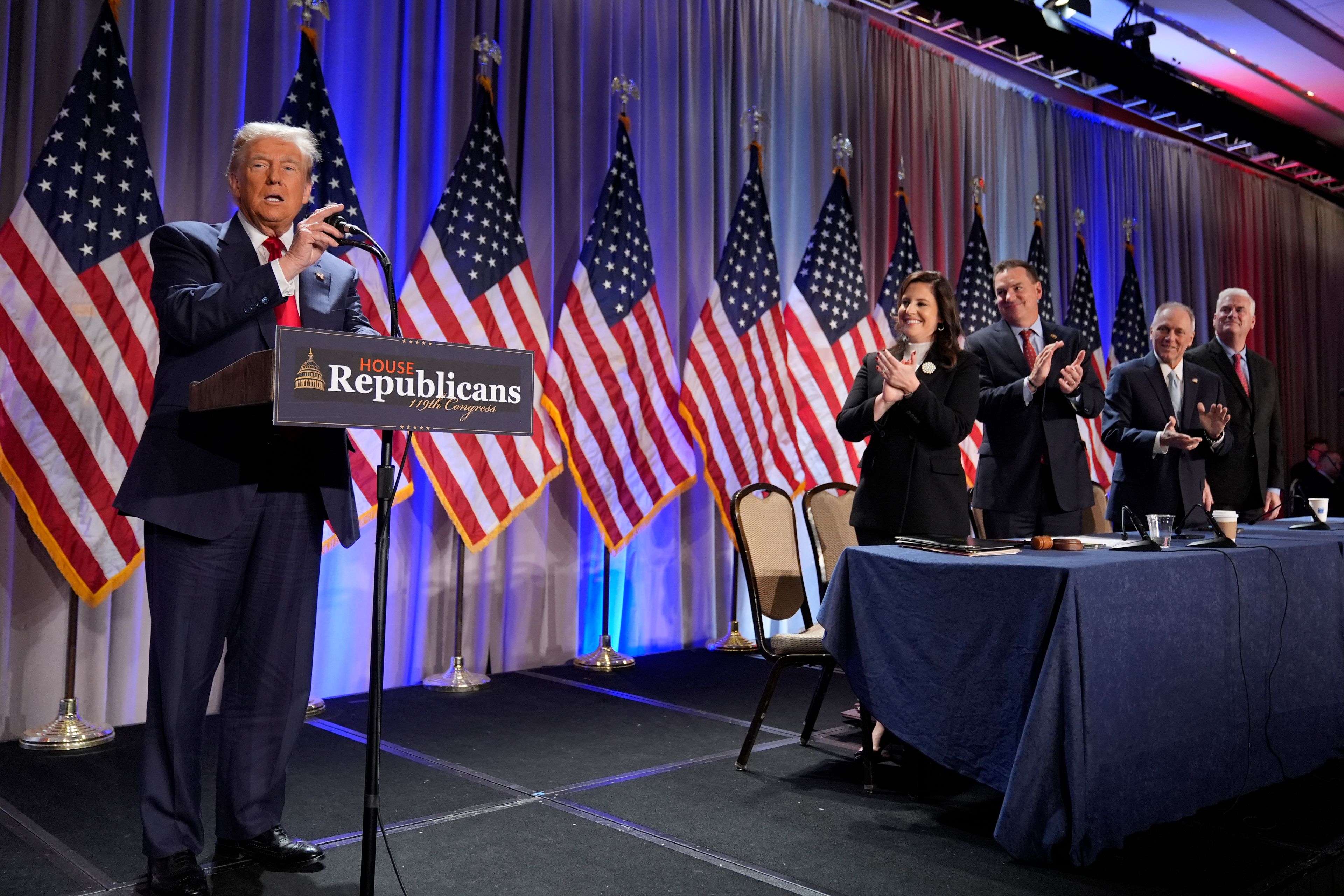 President-elect Donald Trump speaks as he arrives for a meeting with the House GOP conference, Wednesday, Nov. 13, 2024, in Washington. From left are Rep. Elise Stefanik, R-N.Y., Rep. Richard Hudson, R-N.C., Rep. Steve Scalise, R-La., and Rep. Tom Emmer, R-Minn. AP Photo/Alex Brandon)