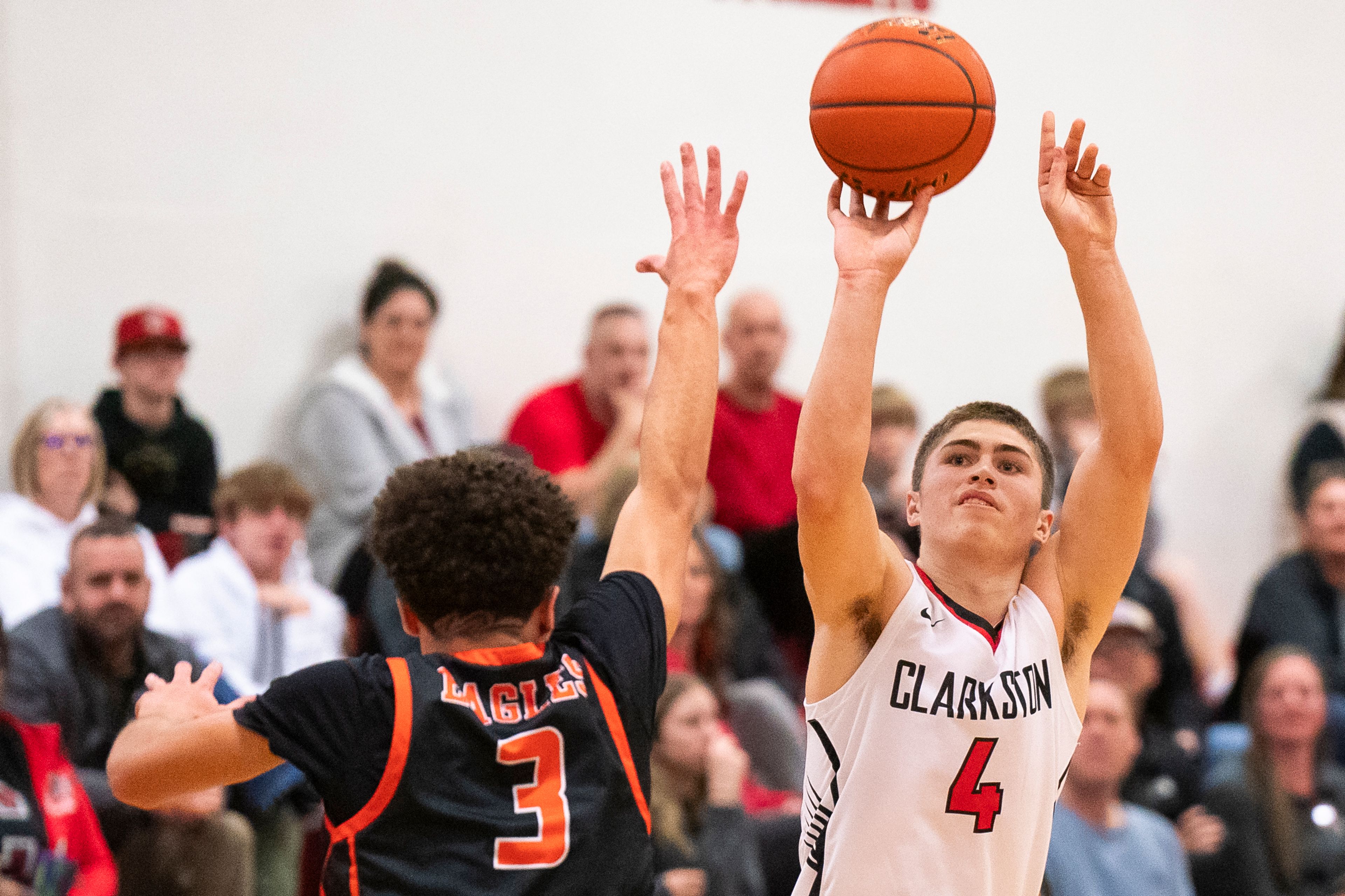 Clarkston’s Xander Van Tine (4) takes a three-point shot during their game against West Valley on Tuesday at Clarkston High School.