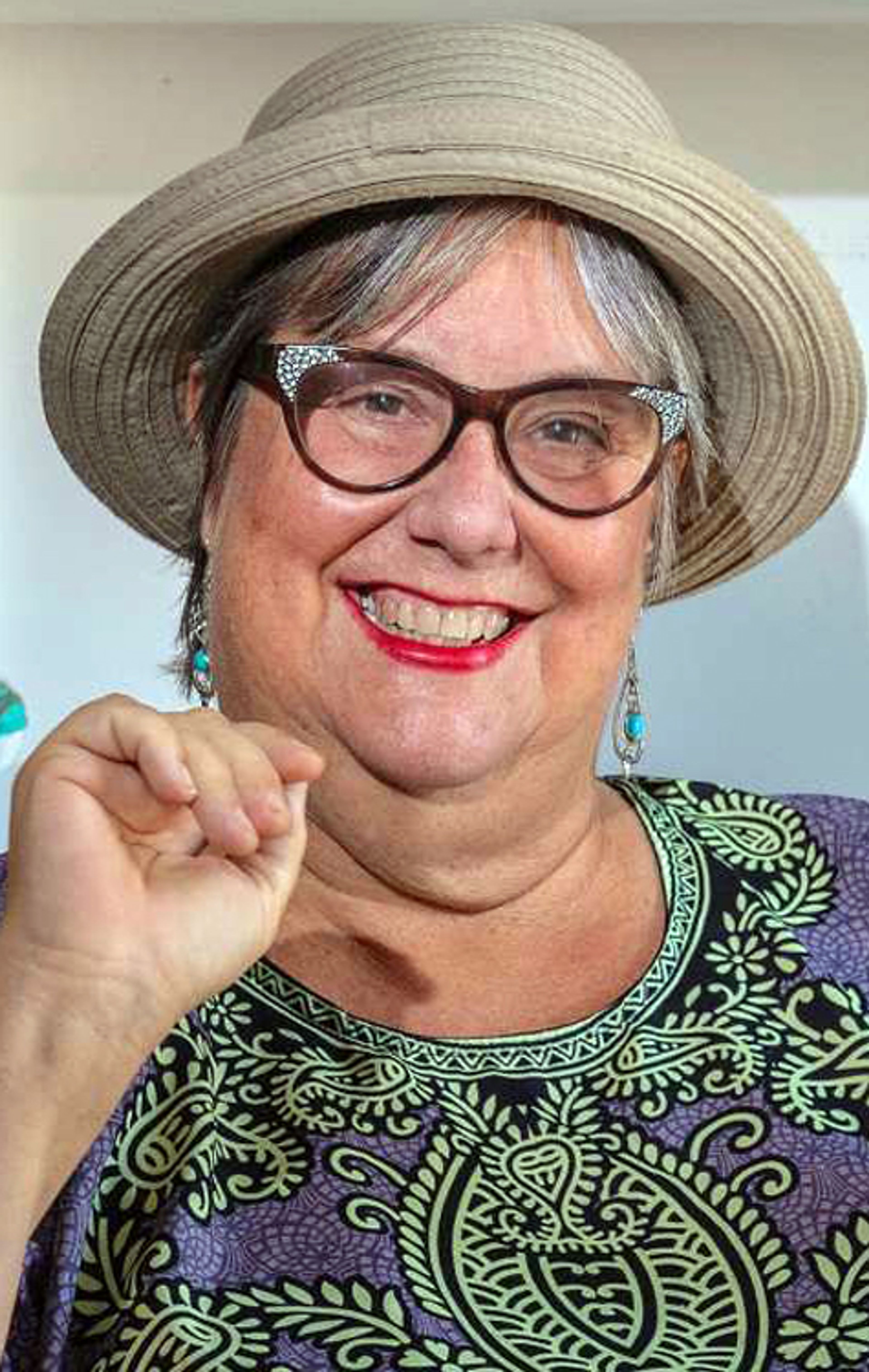 Writer Marla Jo Fisher with various items she has collected on her many travels, at her home in Long Beach on Tuesday, May 4, 2021.(Photo by Mark Rightmire, Orange County Register/SCNG)