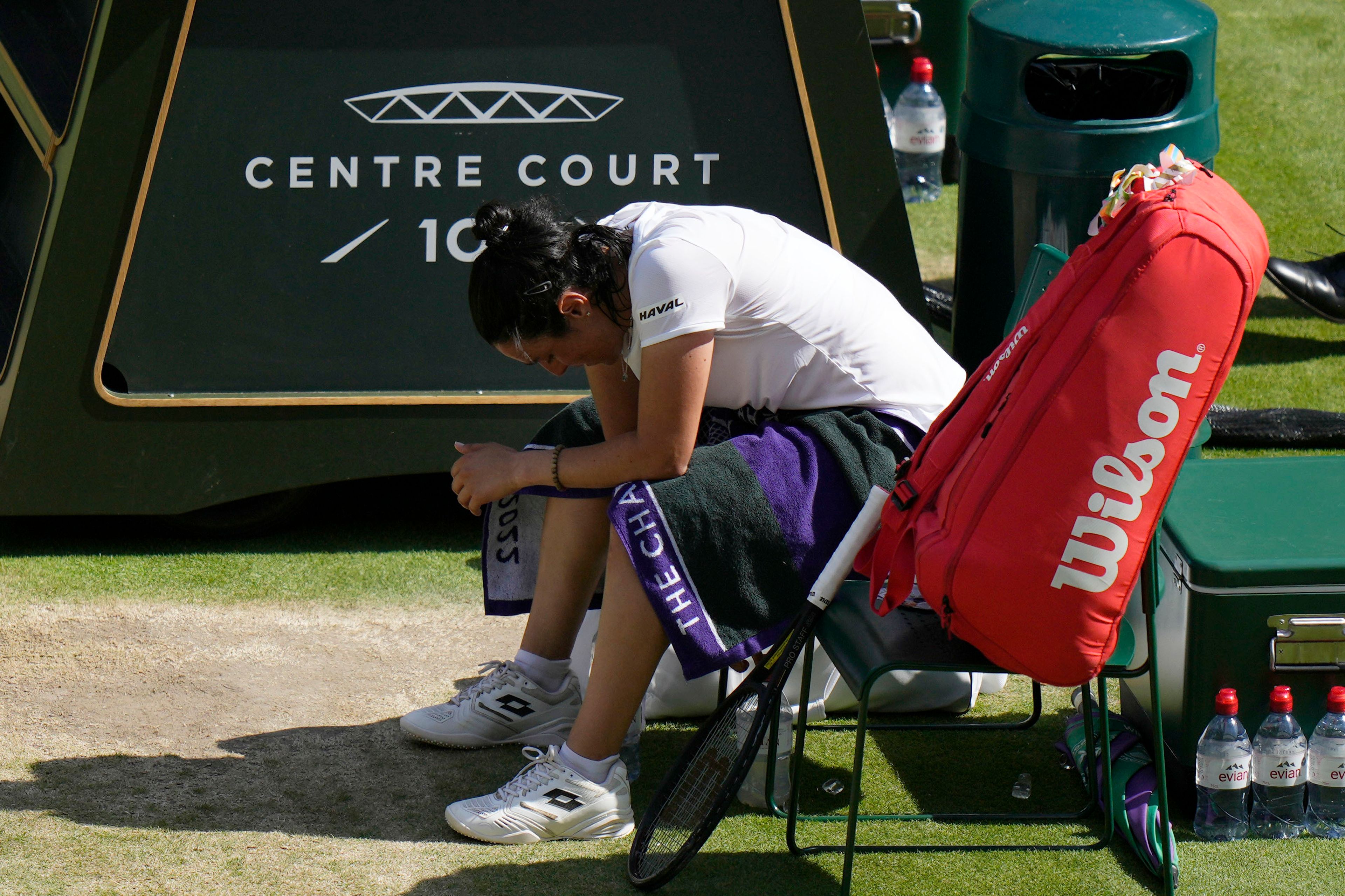 Tunisia's Ons Jabeur reacts after being beaten by Kazakhstan's Elena Rybakina in the final of the women's singles on day thirteen of the Wimbledon tennis championships in London, Saturday, July 9, 2022. (AP Photo/Alastair Grant)