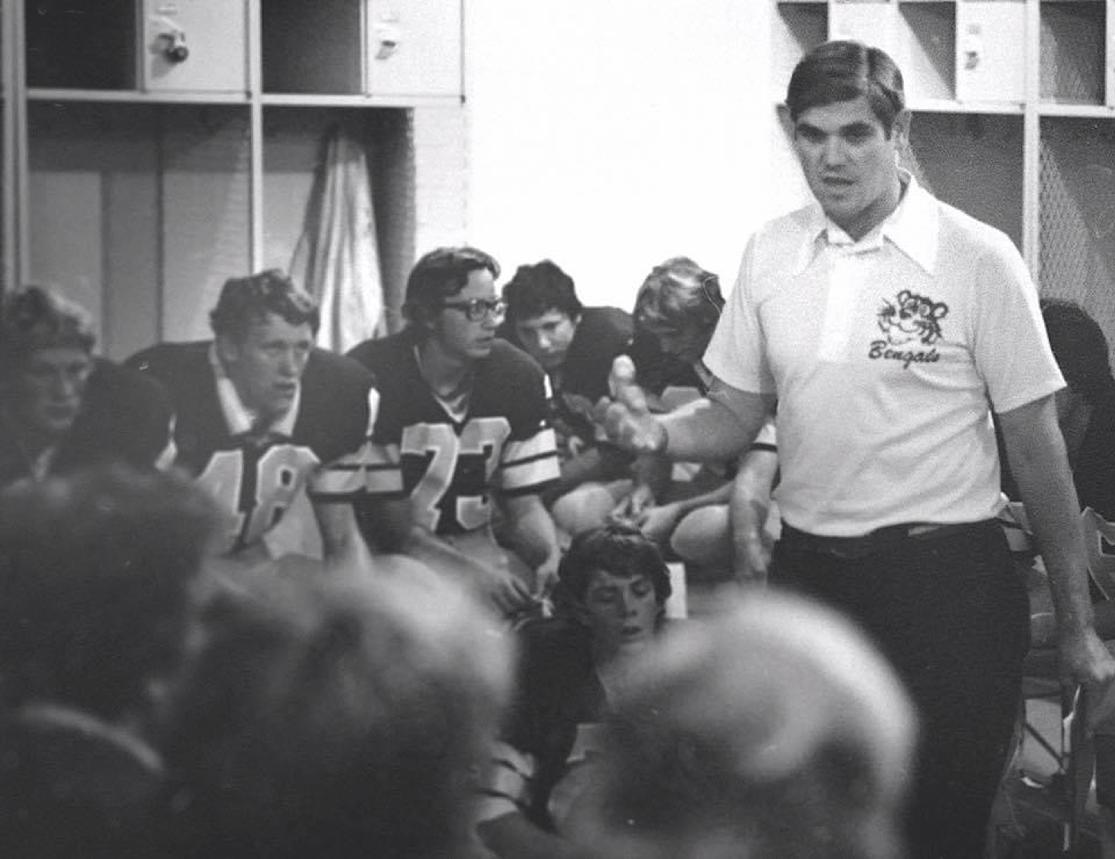 Lewiston football coach Jay Henry gives a pep talk to his team in the locker room at Bengal Field in the late 1970s.