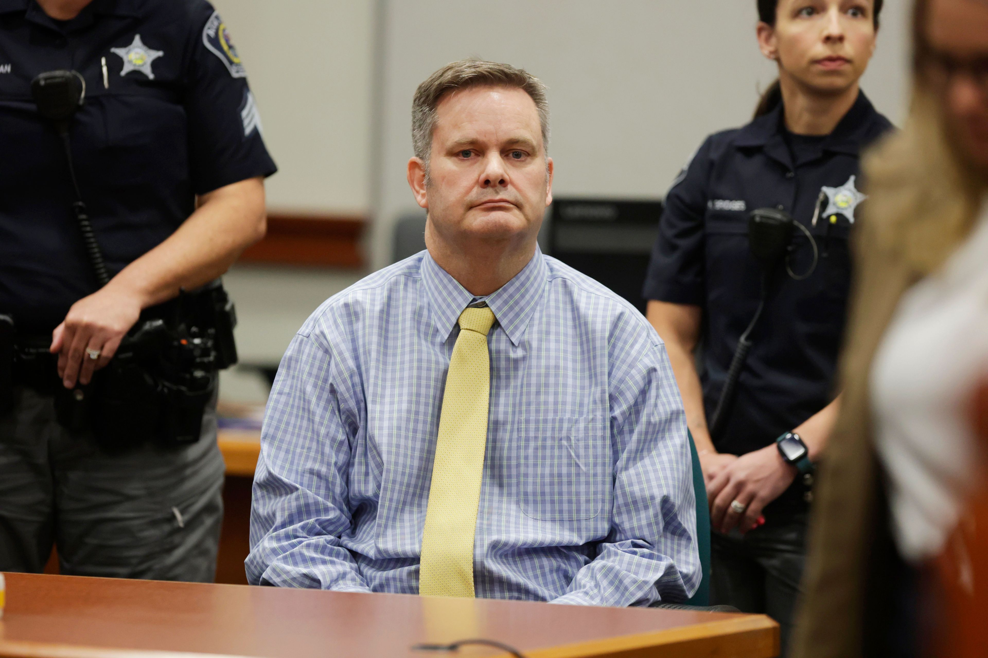 Chad Daybell sits at the defense table after the jury's verdict in his murder trial was read at the Ada County Courthouse in Boise, Idaho, on Thursday, May 30, 2024. Daybell was convicted of killing his wife and his new girlfriend's two youngest kids in a strange triple murder case that included claims of apocalyptic prophesies, zombie children and illicit affairs. (AP Photo/Kyle Green, Pool)