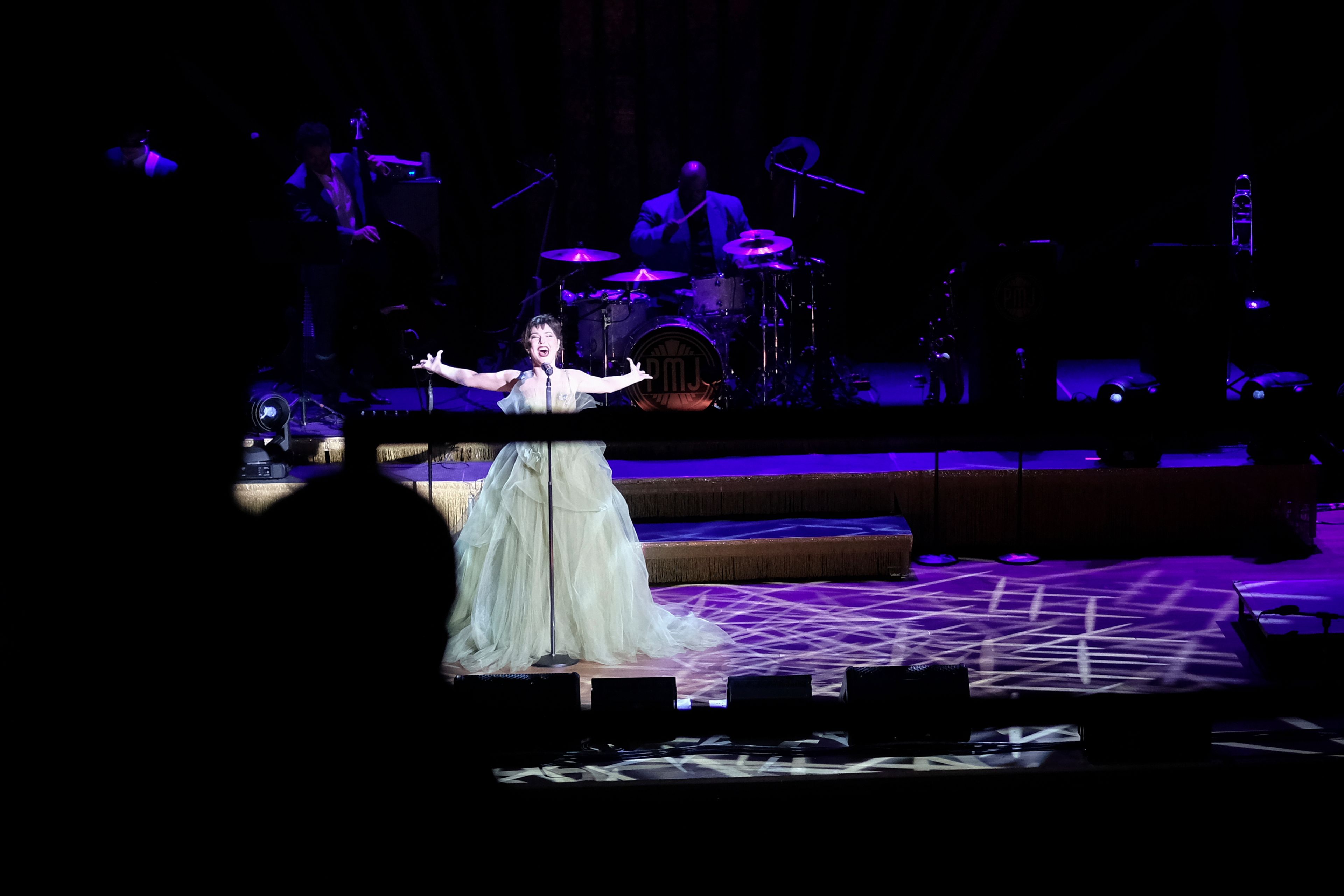 Members of the band Postmodern Jukebox perform on stage at the Ryman Auditorium during a concert in Nashville, Tenn., on July 30, 2024.