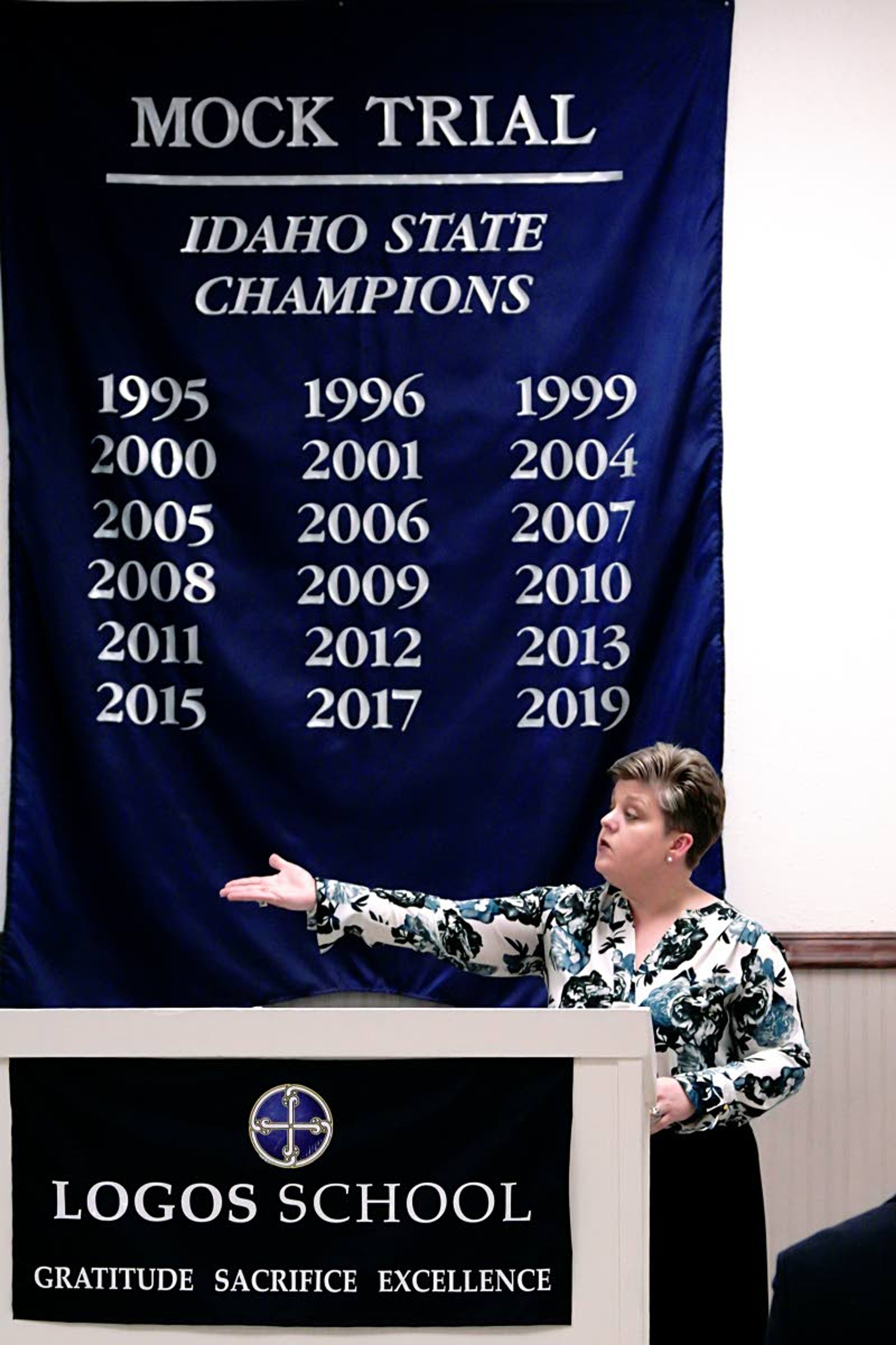 Idaho Supreme Court Judge Robyn Brody speaks at Logos School in Moscow Wednesday evening during an awards ceremony for the mock trial team, which won the state title for the 18th time.