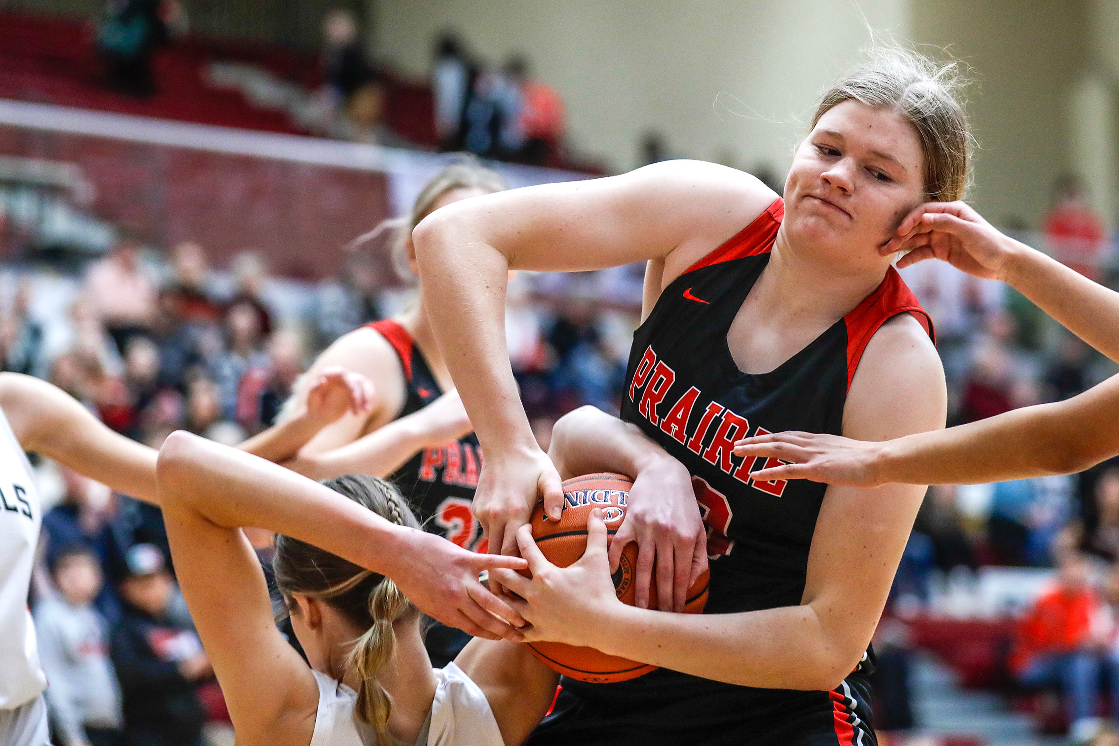 Prairie guard Sage Elven wrestles the ball away from Murtaugh forward Ashlee Stanger during a quarterfinal game in the girls 1A DI state tournament Thursday at Columbia High School in Nampa.