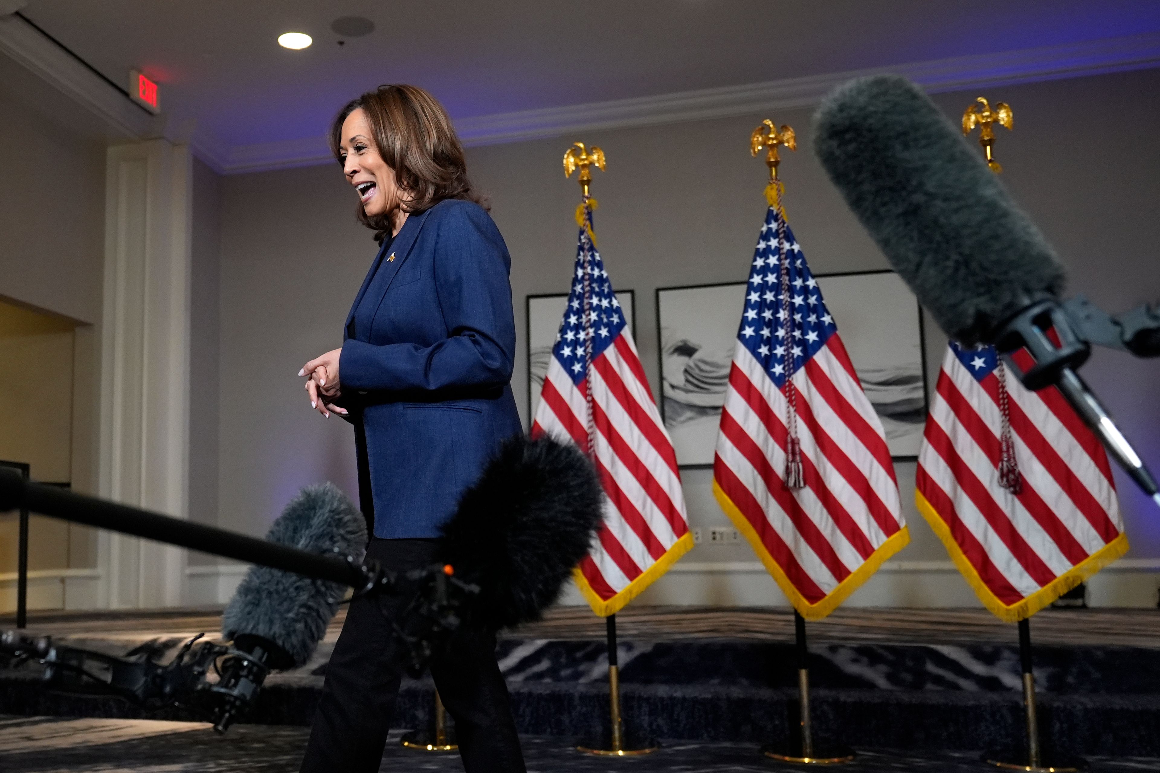 Democratic presidential nominee Vice President Kamala Harris walks away after taking questions from reporters in Houston, Friday, Oct. 25, 2024. (AP Photo/Susan Walsh)