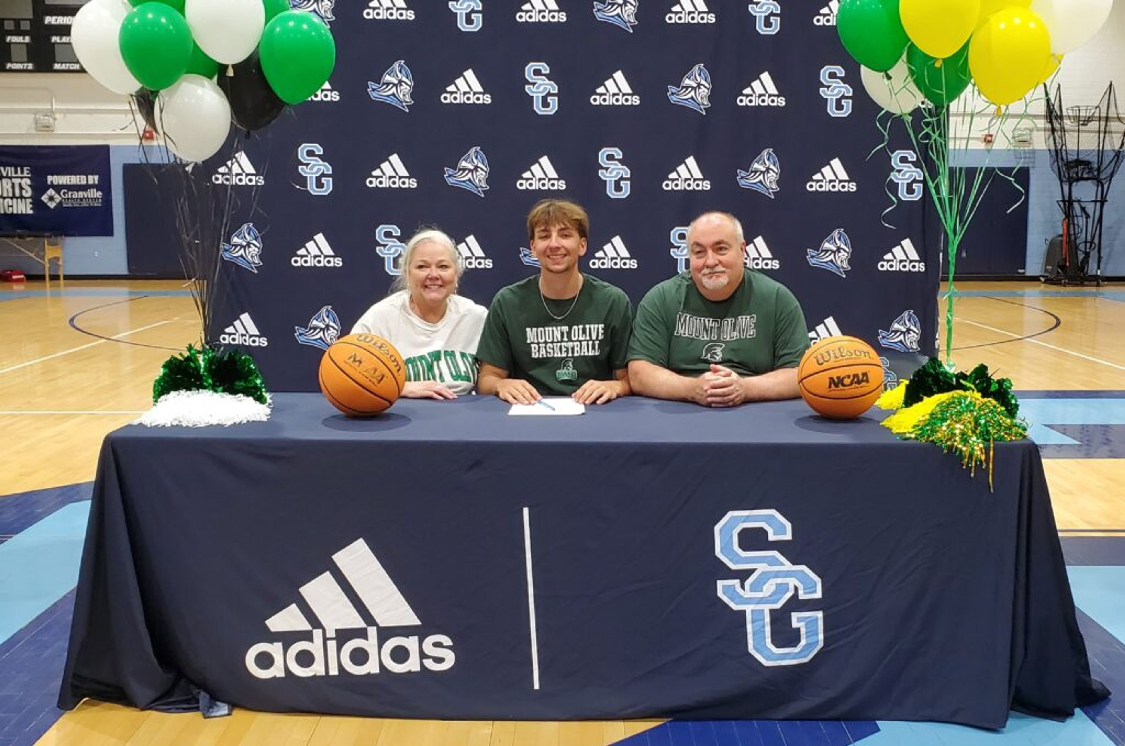 Roberts signs with Mount Olive