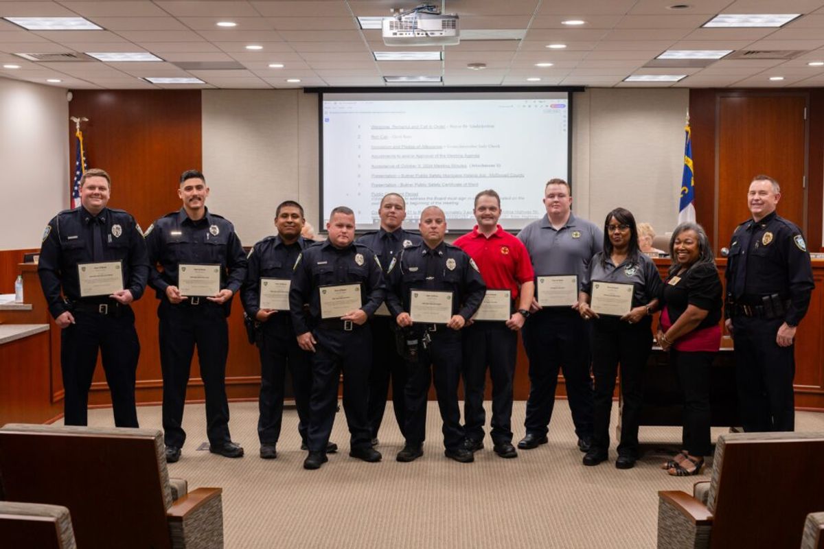 Kevin Rigsbee BPS employees receive Certificate of Merit