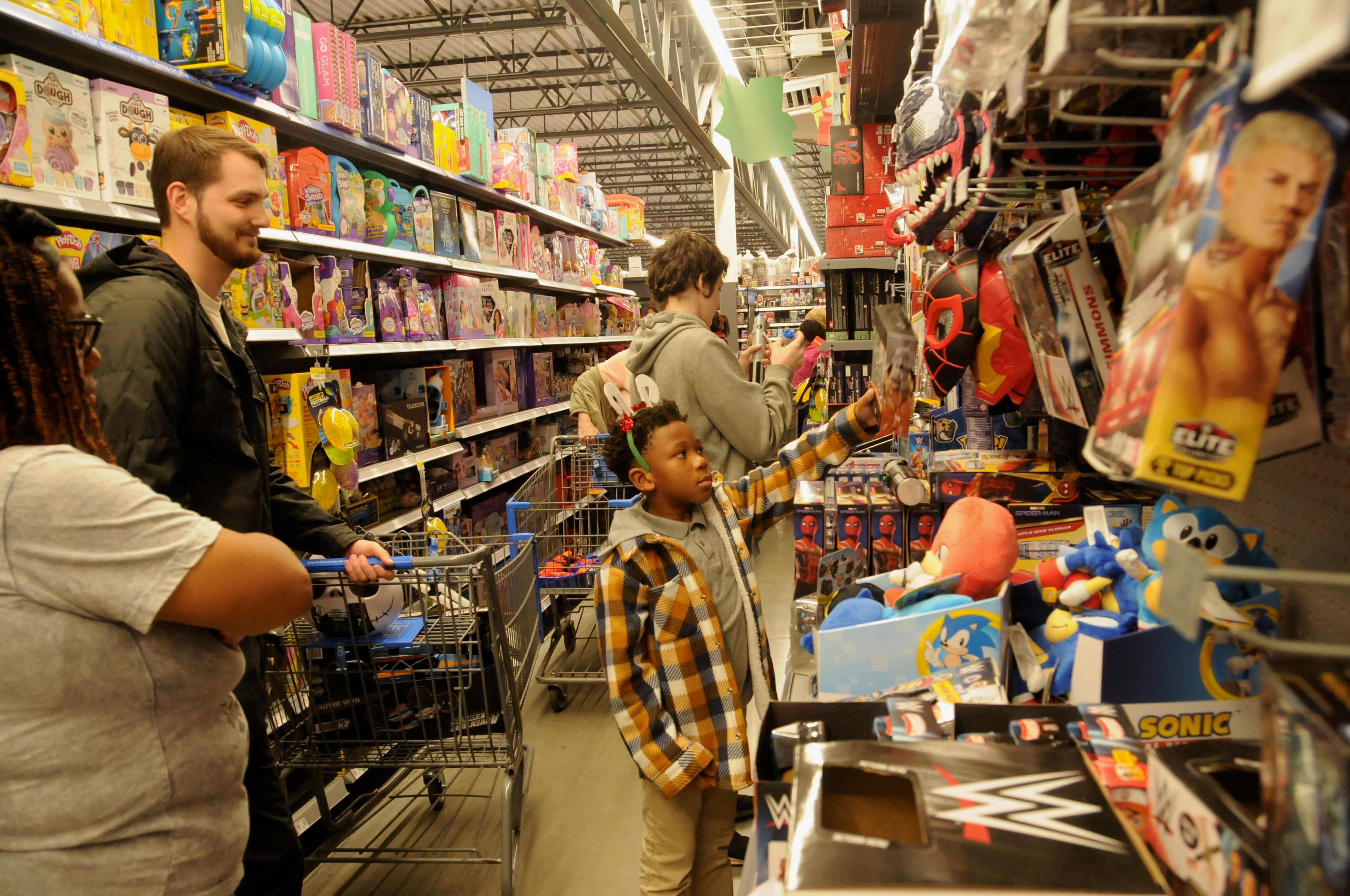 Smiles all around as Atmore kids shop with a cop for Christmas gifts