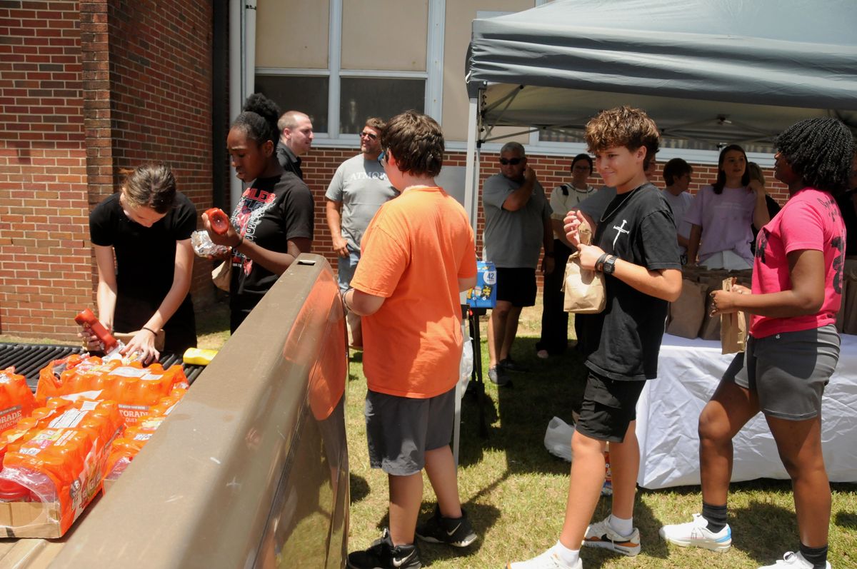 Atmore Area Chamber of Commerce treats Escambia County High School marching band to lunch during camp
