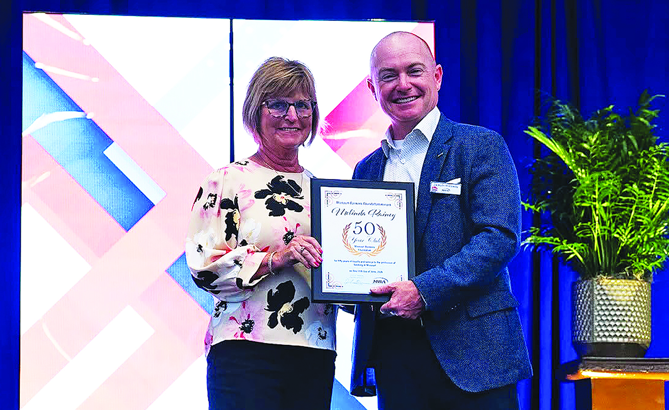 Melinda Rainey honored for 50 years of service to Bank of Advance and community