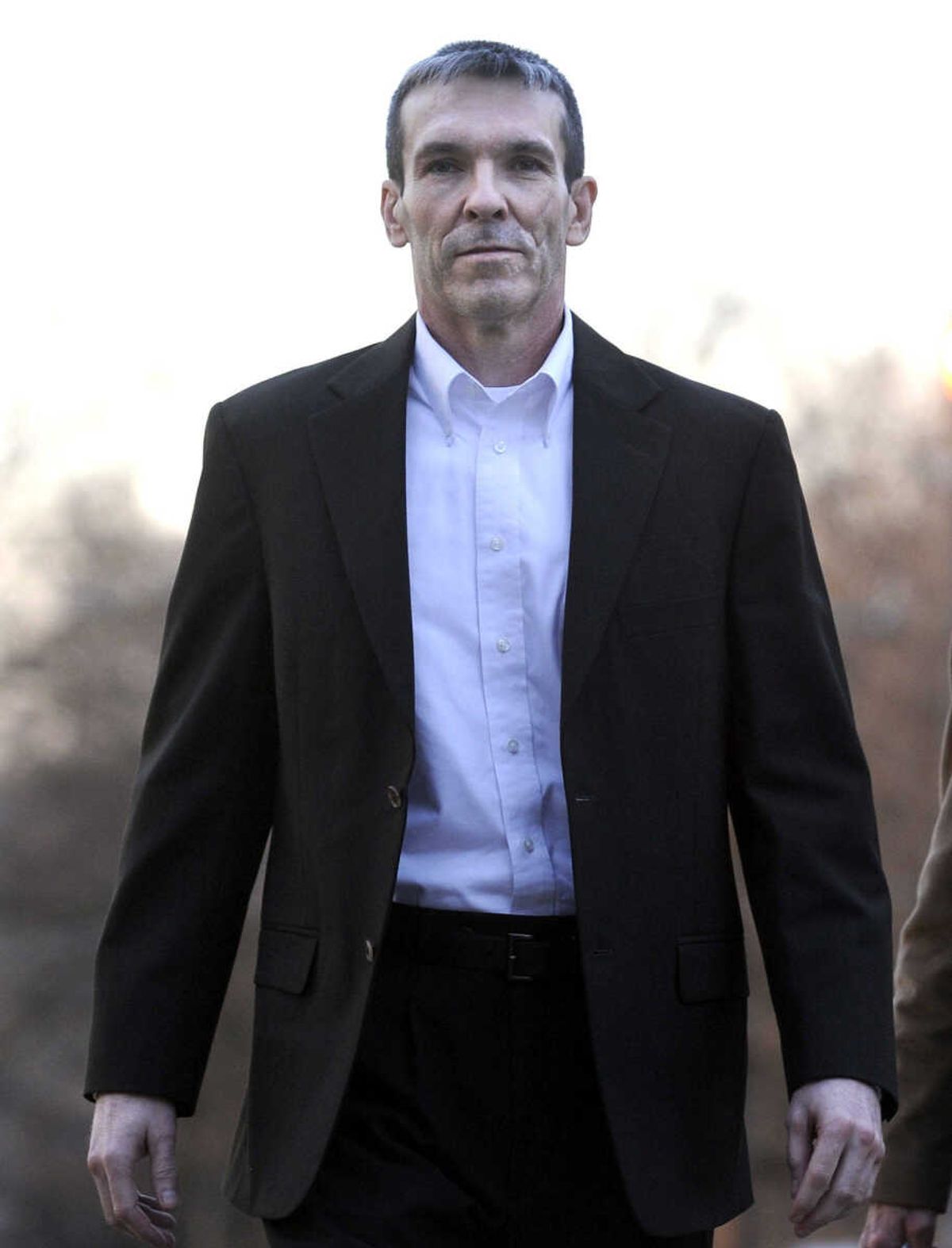 Evans takes the stand in murder trial