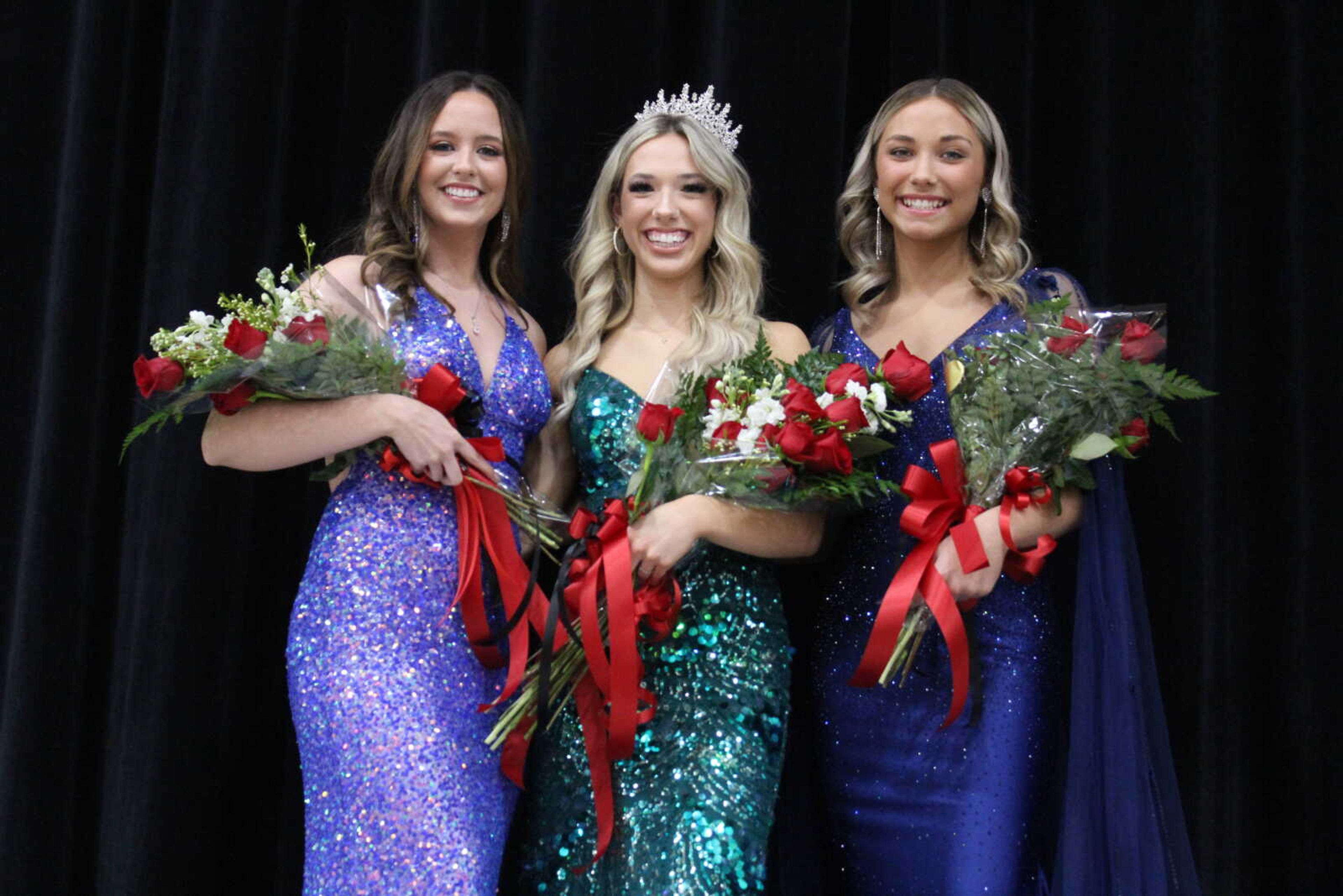 Callie
Whitaker was crowned the 2023 Winter Homecoming Queen Friday evening
at the Dexter Bearcat Event Center. She is the daughter of Melissa
and Joe Whitaker. Pictured from left is second alternate Abriana
Frazier, daughter of Crystal Gibson and Russ Gibson; Whitaker and
first alternate Allison Turnbo, daughter of Holly and Jason Turnbo.