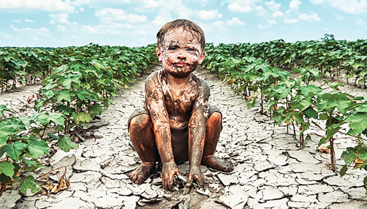 Toddler’s playful moment in Missouri cotton field wins top prize in state photo contest