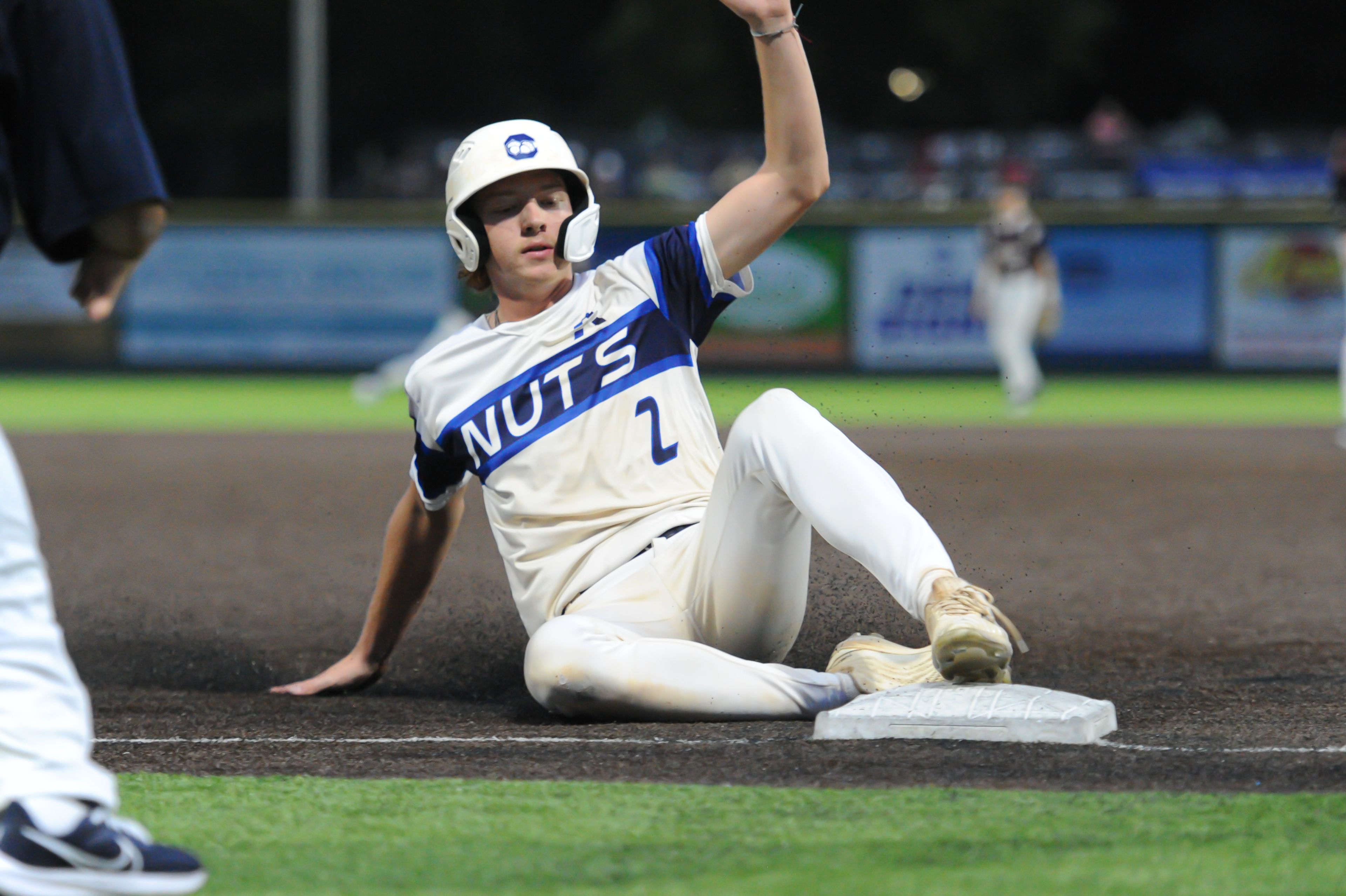 Aycorp's Owen Willis slides into third base during a Monday, August 12, 2024 Babe Ruth World Series game between the Aycorp Fighting Squirrels and Altoona, Pennsylvania. Aycorp won, 13-3 in five innings.