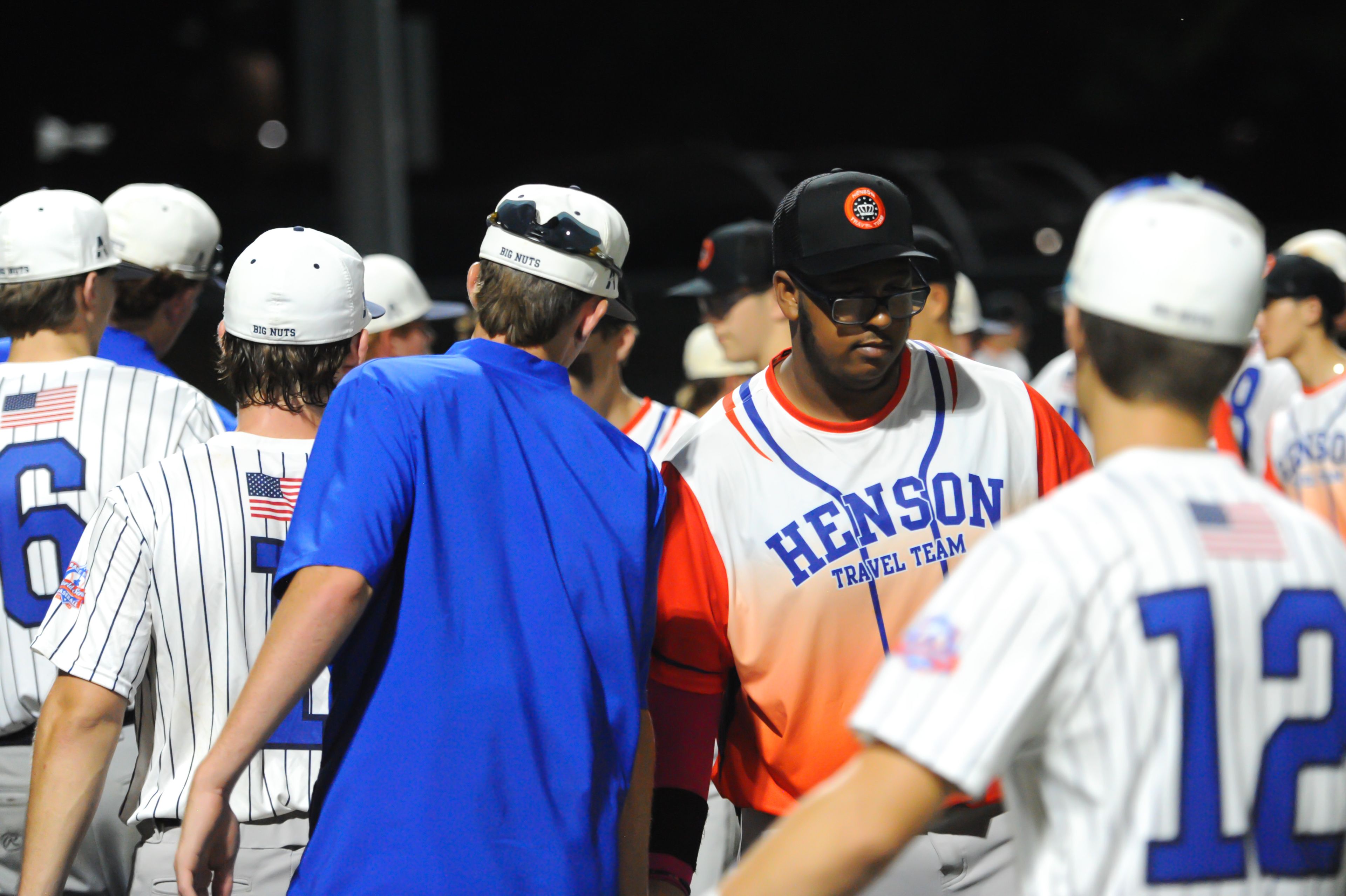 Aycorp and Netherlands players shake hands following a Tuesday, August 13, 2024 Babe Ruth World Series game between the Aycorp Fighting Squirrels and Holland Henson of the Netherlands at Capaha Field in Cape Girardeau, Mo. Aycorp defeated the Netherlands, 12-2 in five innings.