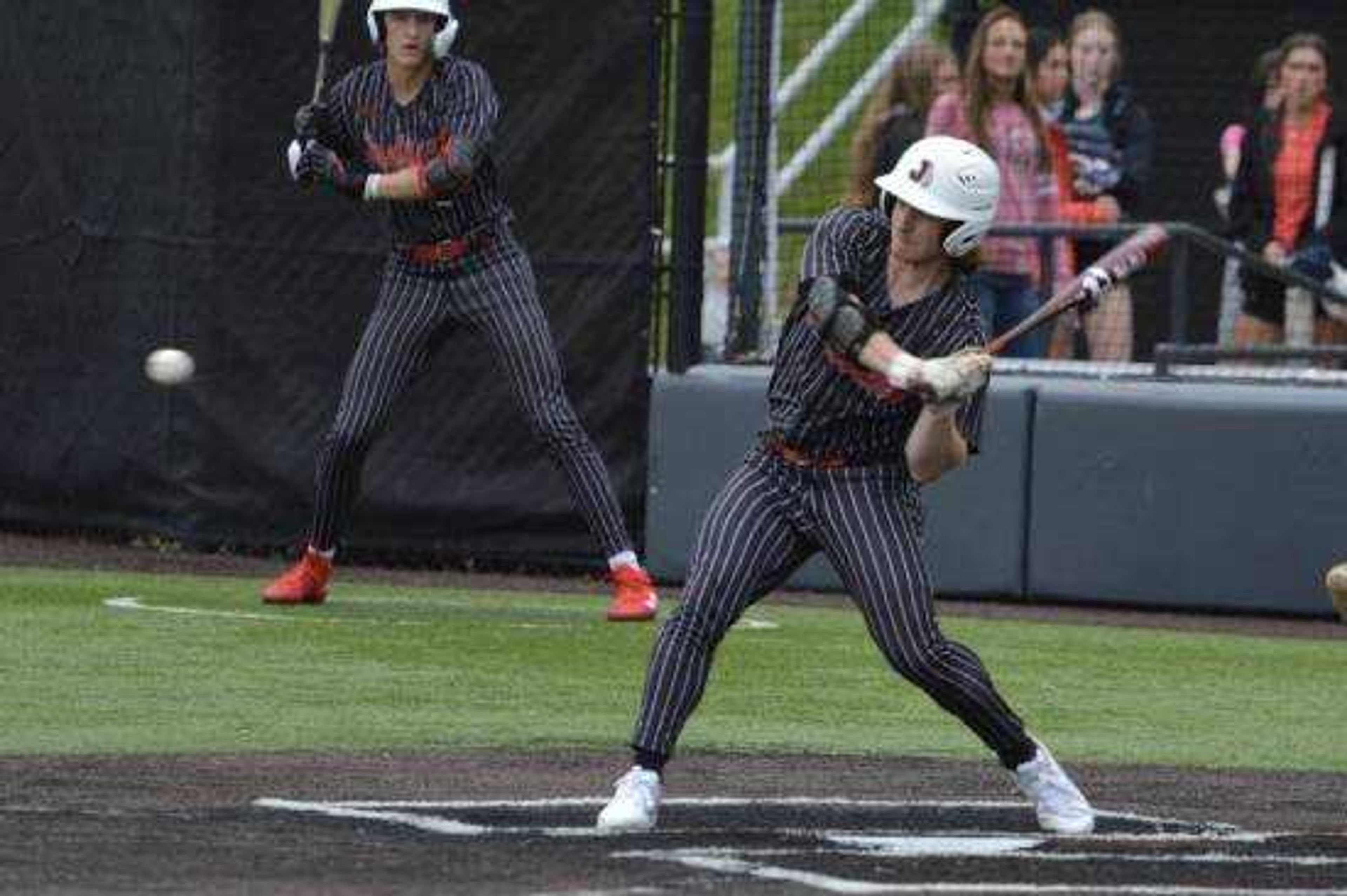 Jackson�s Cooper Rhodes takes a swing during the SEMO Conference Tournament Championship game against Dexter at Capaha Field.