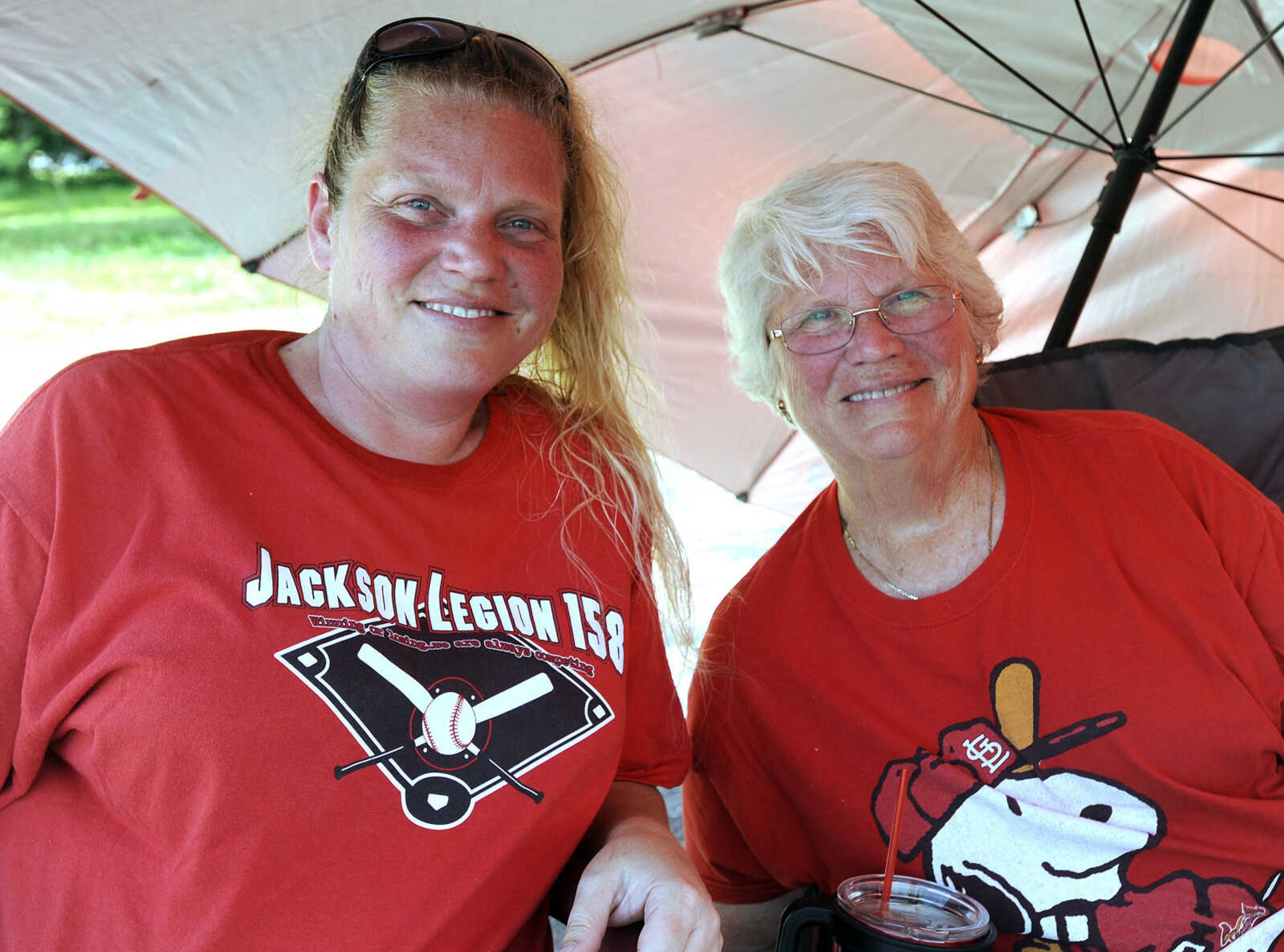 FRED LYNCH ~ flynch@semissourian.com
April Harris, left, and Reita Conley pose for a photo Thursday, June 7, 2918 at the Jackson-Cape Girardeau Senior Legion baseball game in Jackson.