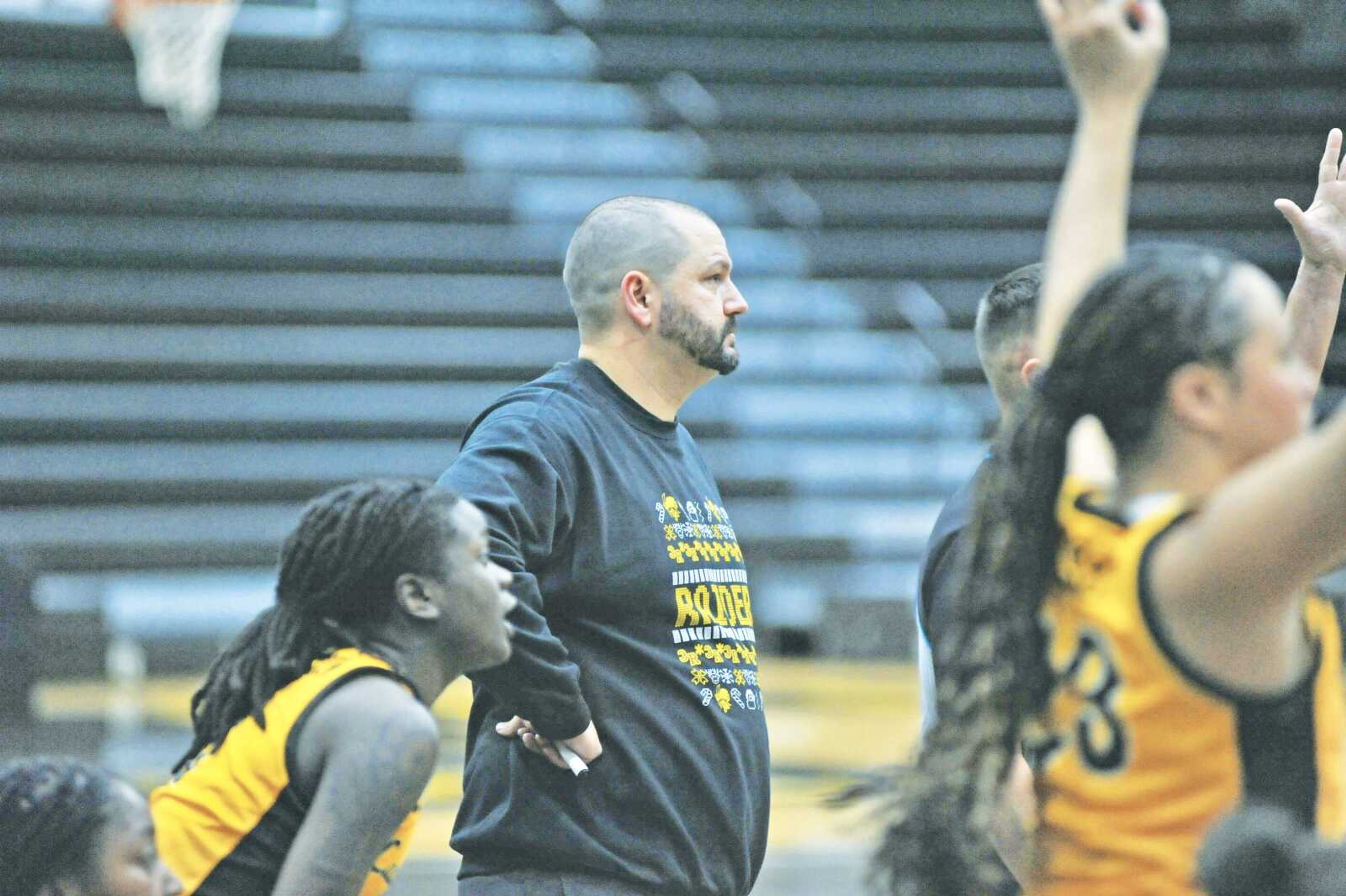 Three Rivers College women�s basketball coach Alex Wiggs watches his team during a recent win over Dyersburg State last weekend at Libla. 