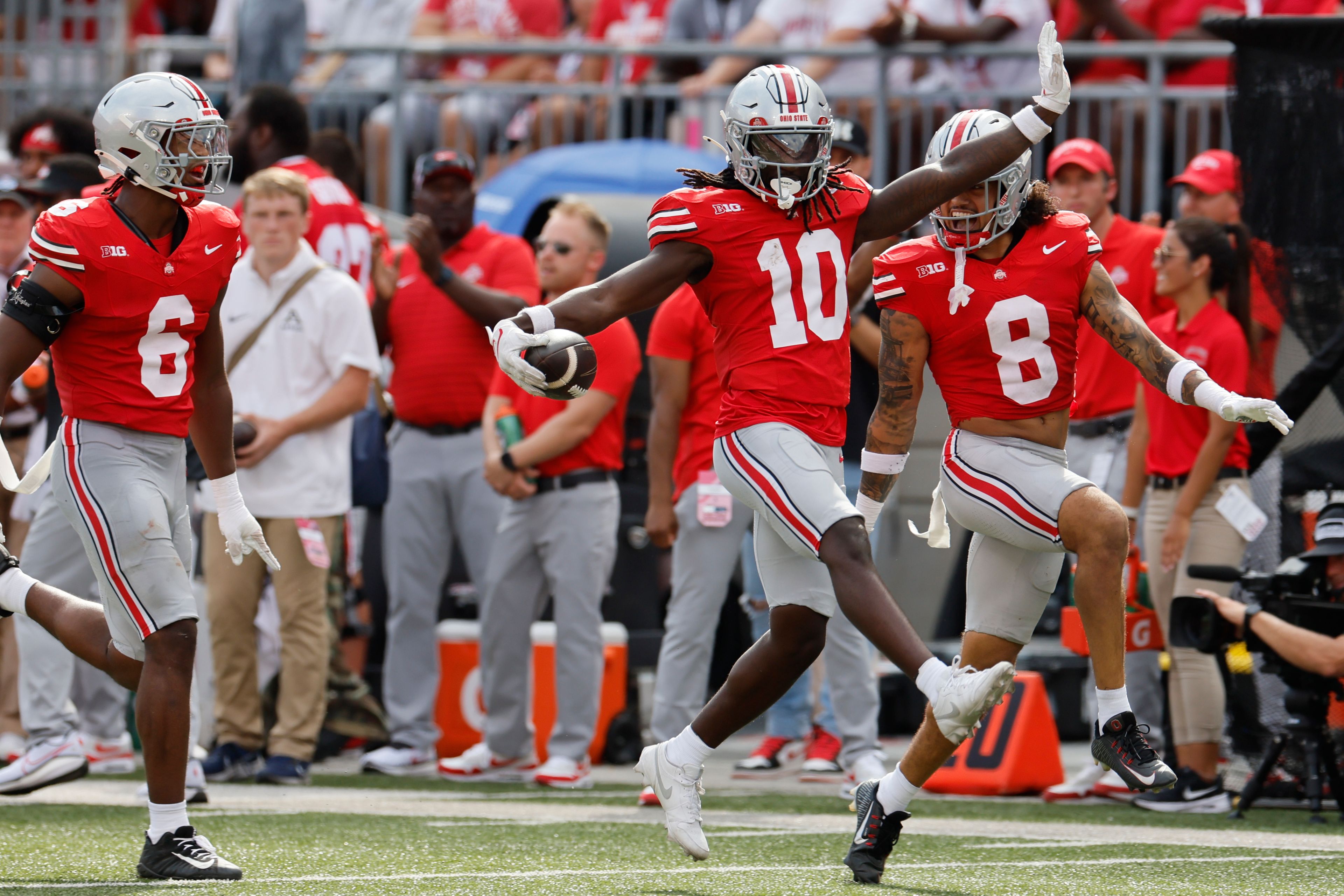 Ohio State defensive back Denzel Burke celebrates his interception against Akron during the first half of an NCAA college football game Saturday, Aug. 31, 2024, in Columbus, Ohio. (AP Photo/Jay LaPrete)