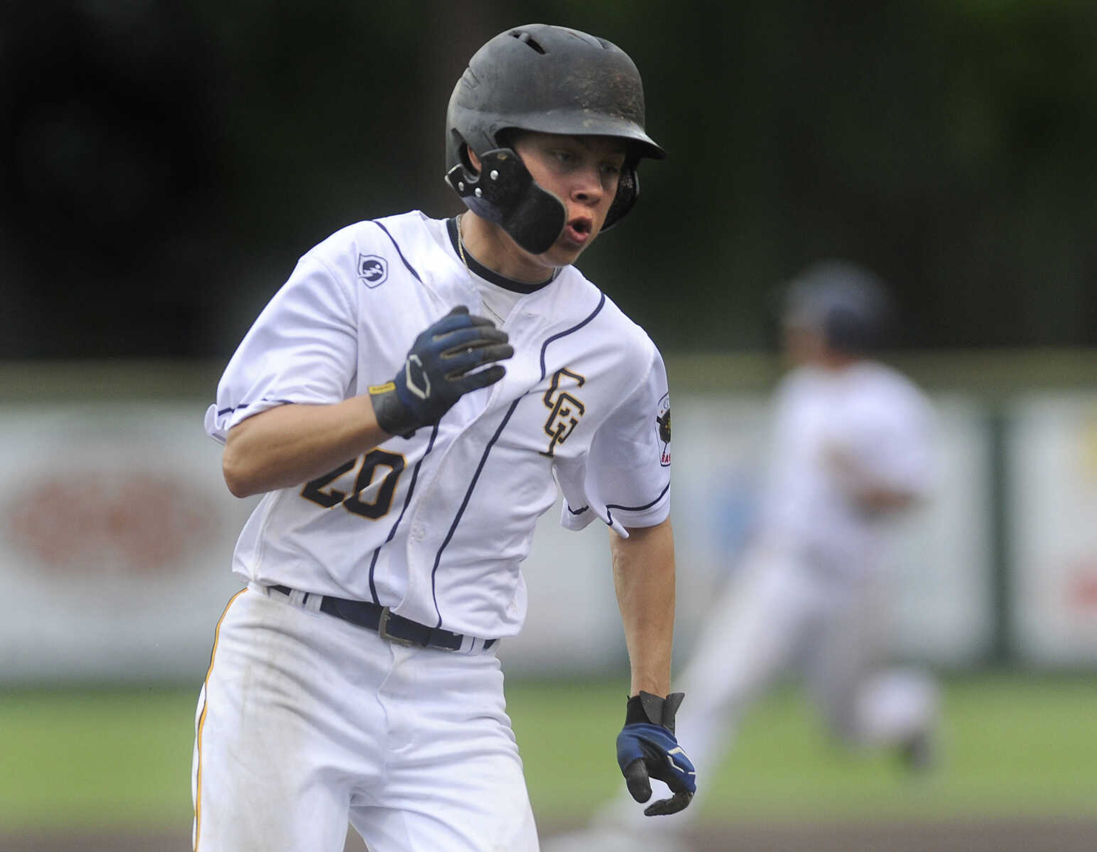 FRED LYNCH ~ flynch@semissourian.com
Cape Girardeau Senior Legion's Lane Robinson heads for home on a double by Trevor Haas against Pemiscot County on Tuesday, June 12, 2018 at Capaha Field.