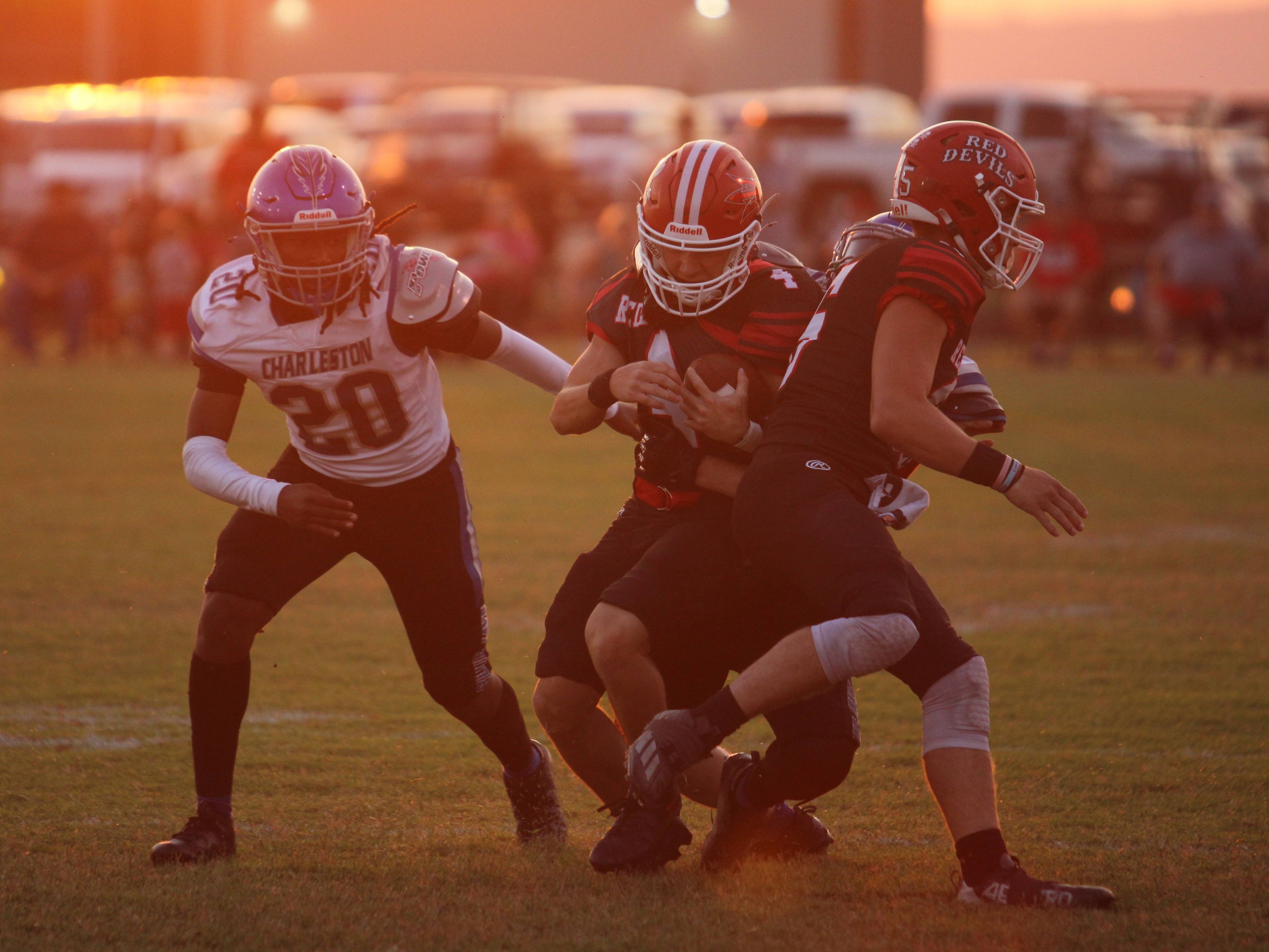 Chaffee's Logan Horton is tackled from behind during the Friday, September 6, 2024 game between the Charleston Blue Jays and the Chaffee Red Devils at Chaffee High School in Chaffee, Mo. Charleston defeated Chaffee 38-0. 