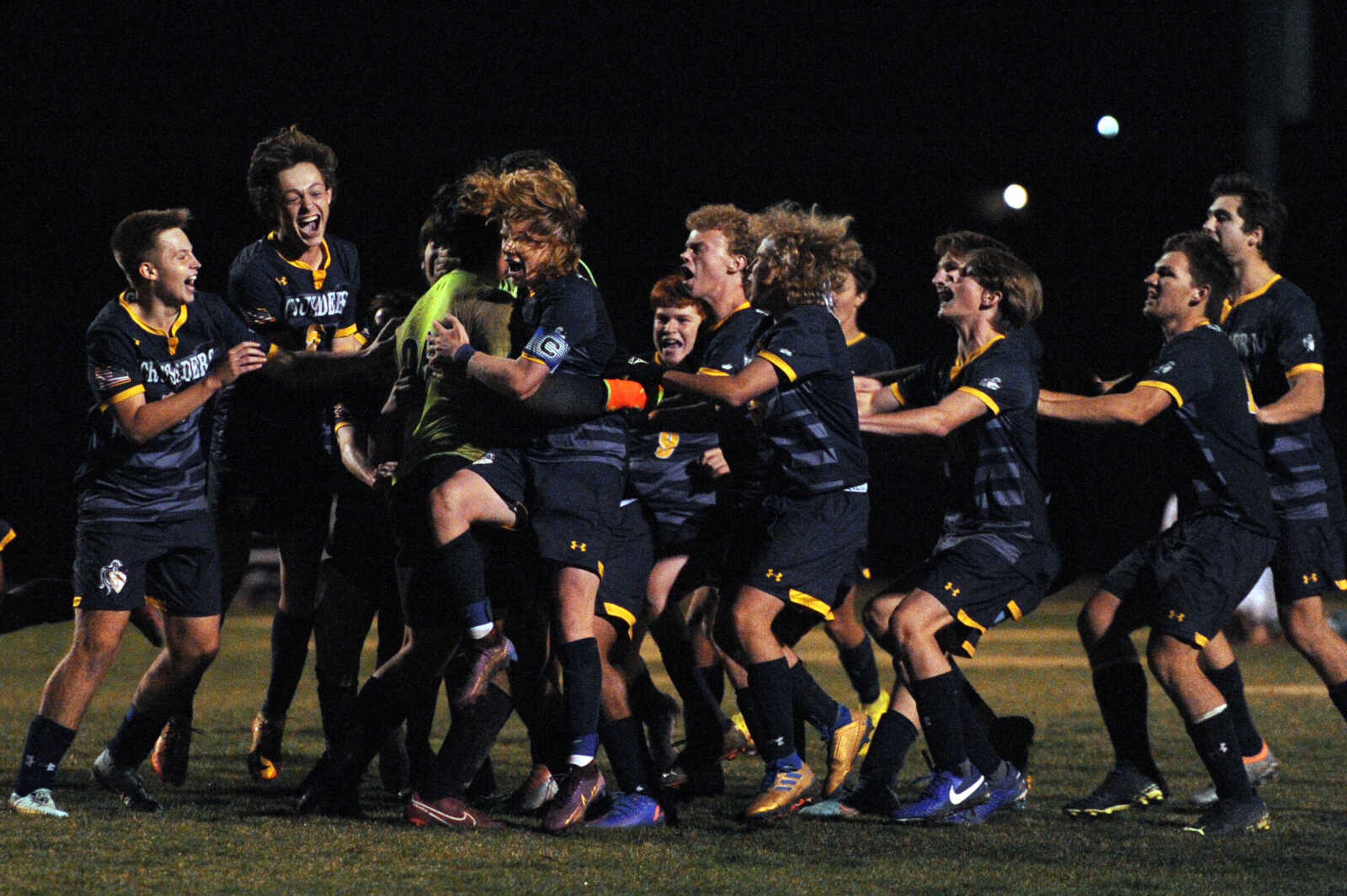 Saxony Lutheran players rush the field after defeating Perryville in the Class 2 District 1 semifinals on Tuesday at The Bank of Missouri Soccer Complex in Perryville.