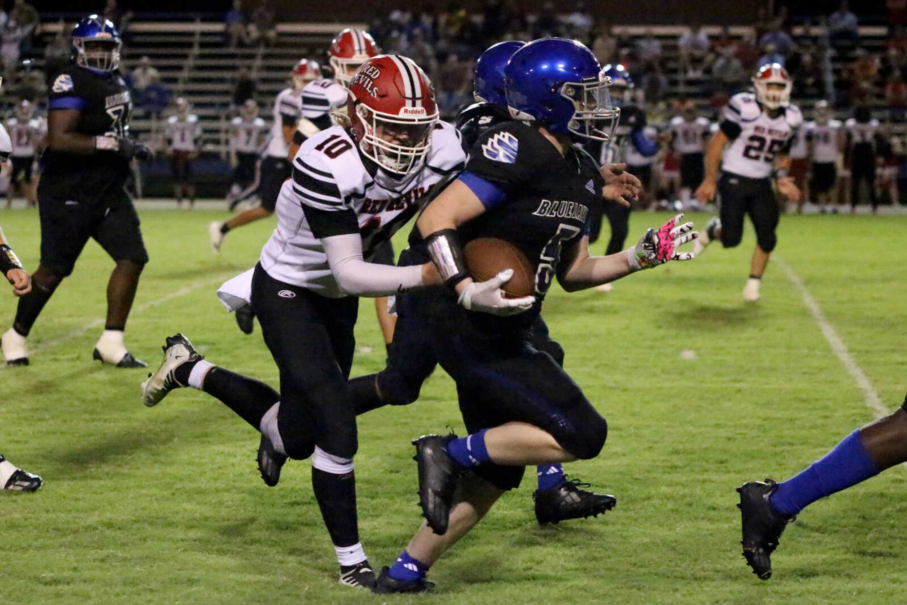 Charleston's Kaden Branam (5) runs for a big gain&nbsp;during a 14-12 loss to Chaffee at John Harris Marshall Stadium on Thursday, August 31, 2023.&nbsp;