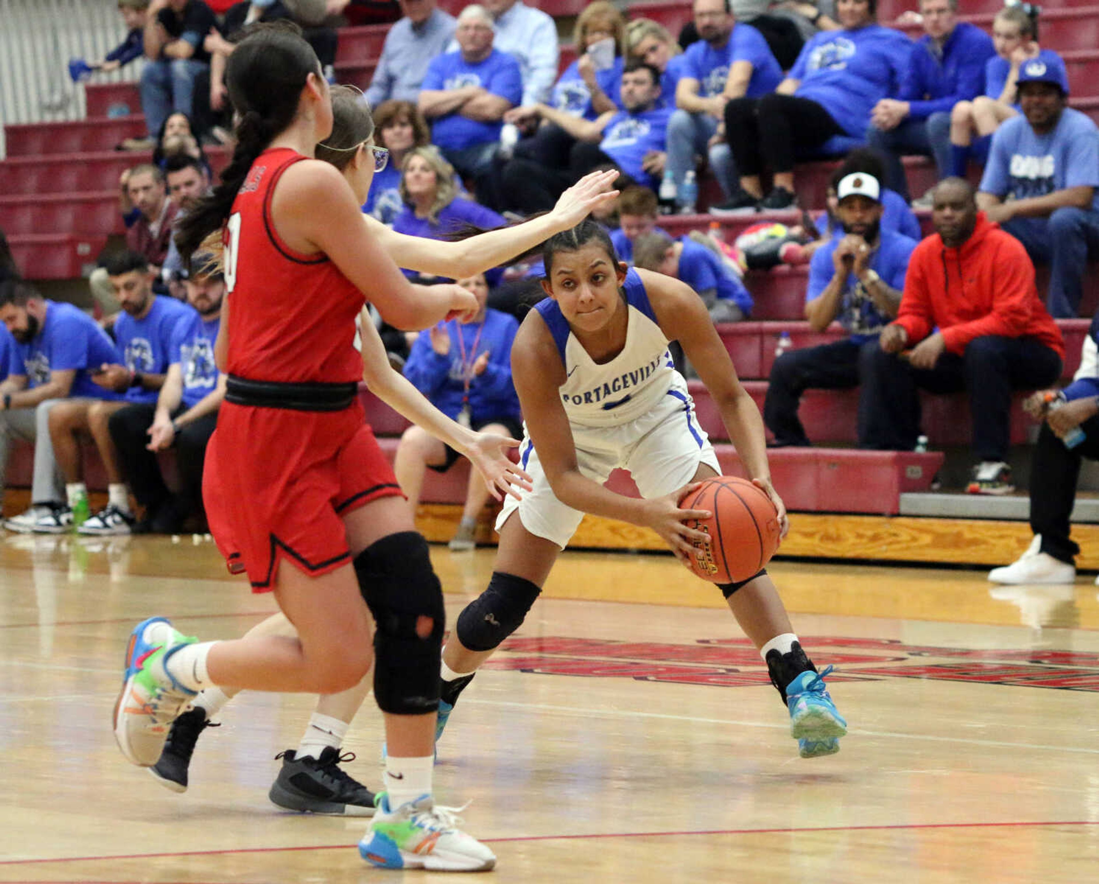 Portageville's Jayla Weddington (3) sizes up a defender&nbsp;during a 61-25 win over Woodland in a MSHSAA Class 3 Sectional at the Sikeston Fieldhouse on Monday, Feb. 28. (Dennis Marshall/Standard-Democrat)