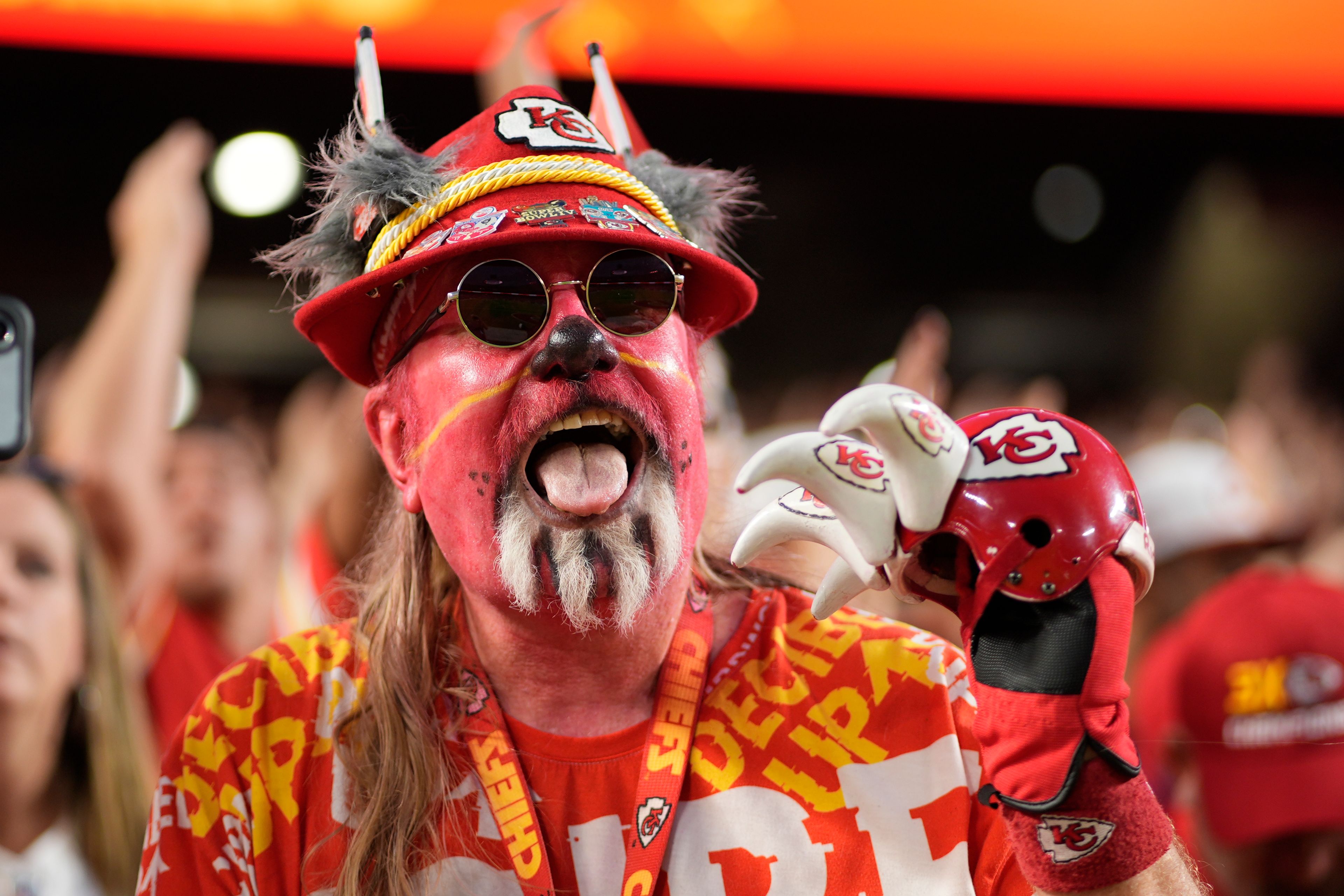 A fan is seen before the start of an NFL football game between the Kansas City Chiefs and the Baltimore Ravens Thursday, Sept. 5, 2024, in Kansas City, Mo. (AP Photo/Charlie Riedel)