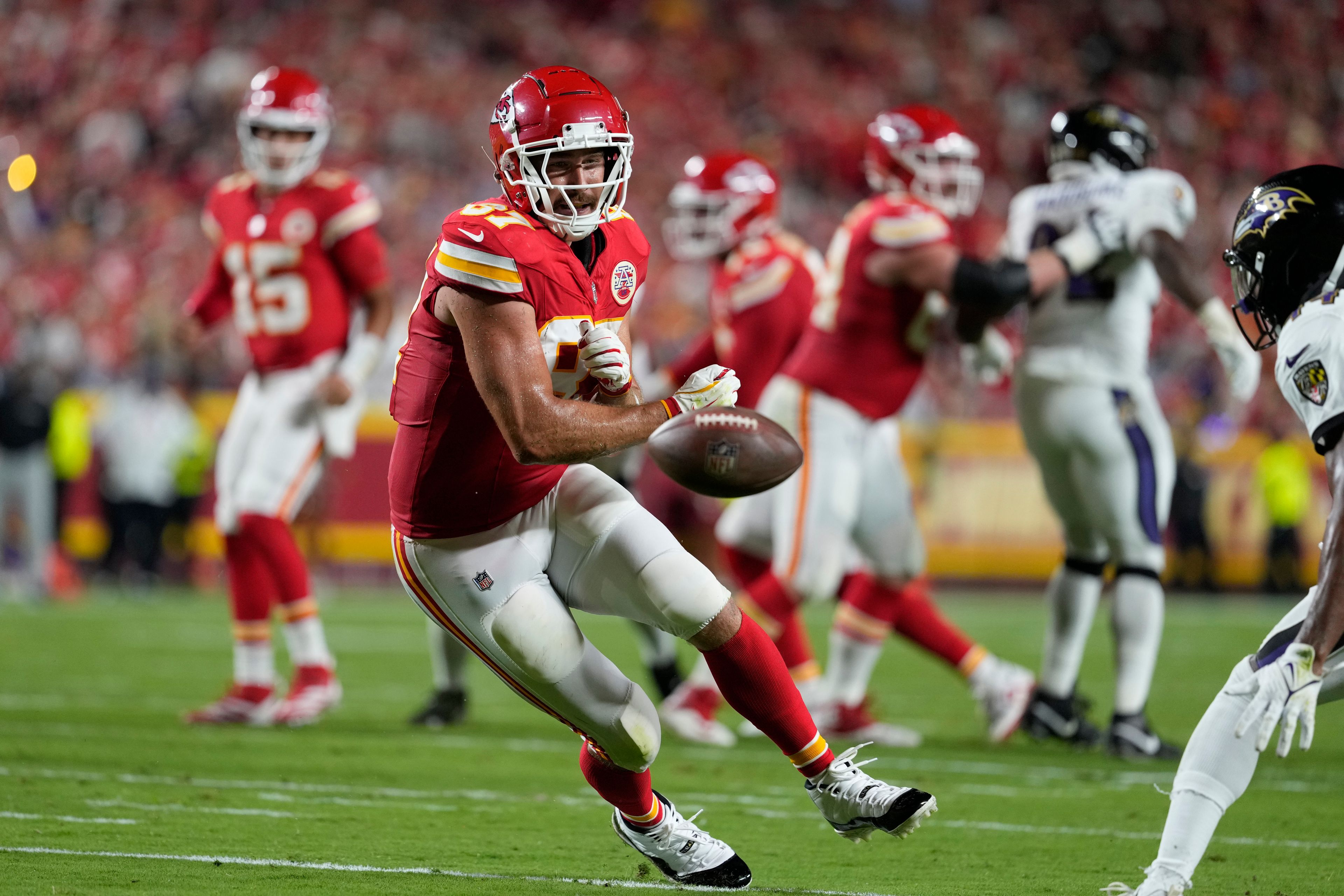 Kansas City Chiefs tight end Travis Kelce is unable to catch a pass during the first half of an NFL football game against the Baltimore Ravens Thursday, Sept. 5, 2024, in Kansas City, Mo. (AP Photo/Ed Zurga)