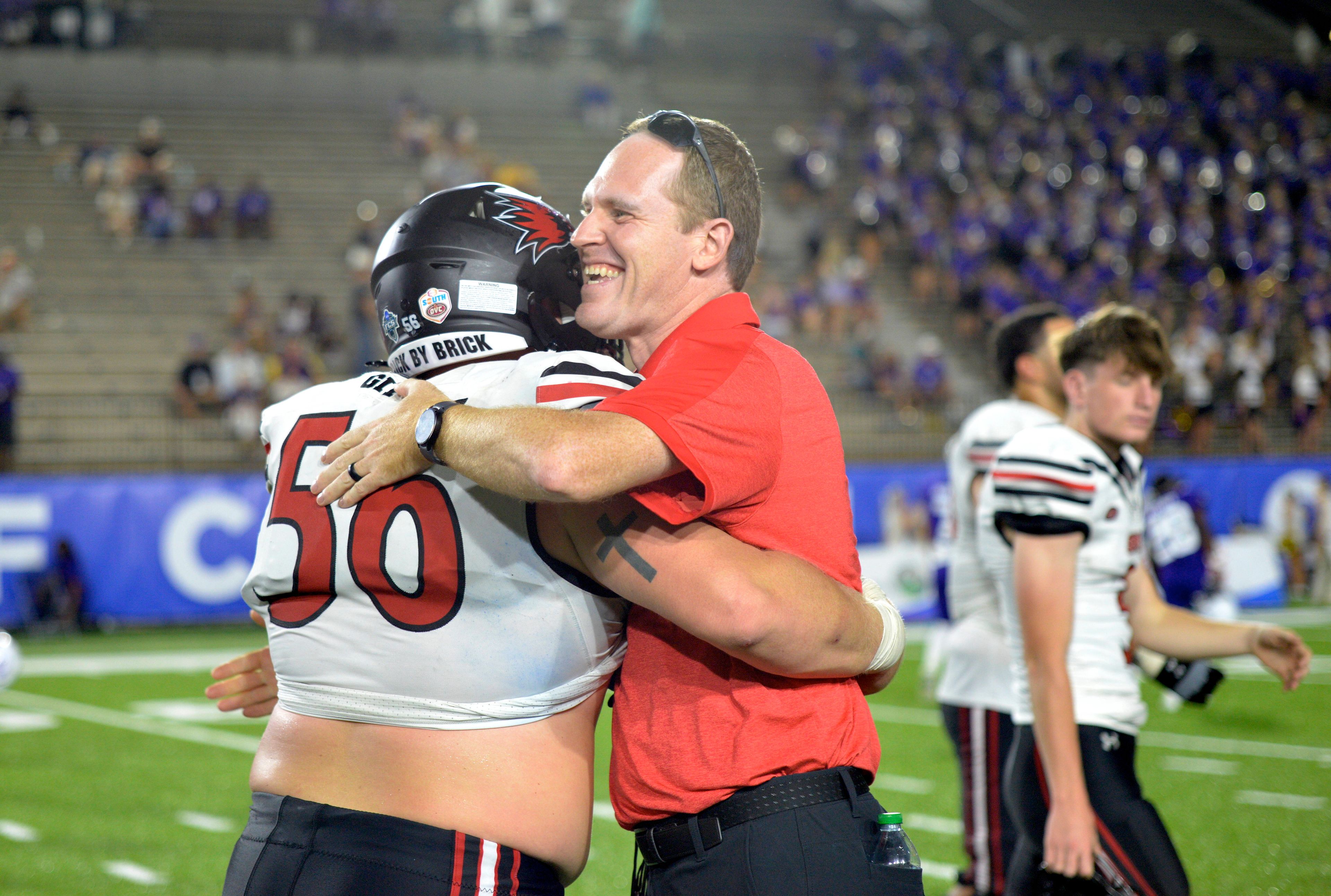 Southeast Missouri State athletic director Brady Barke celebrates with center Zack Geig after a win against North Alabama in the FCS Kickoff on Saturday, August 24, in Montgomery, Alabama. 