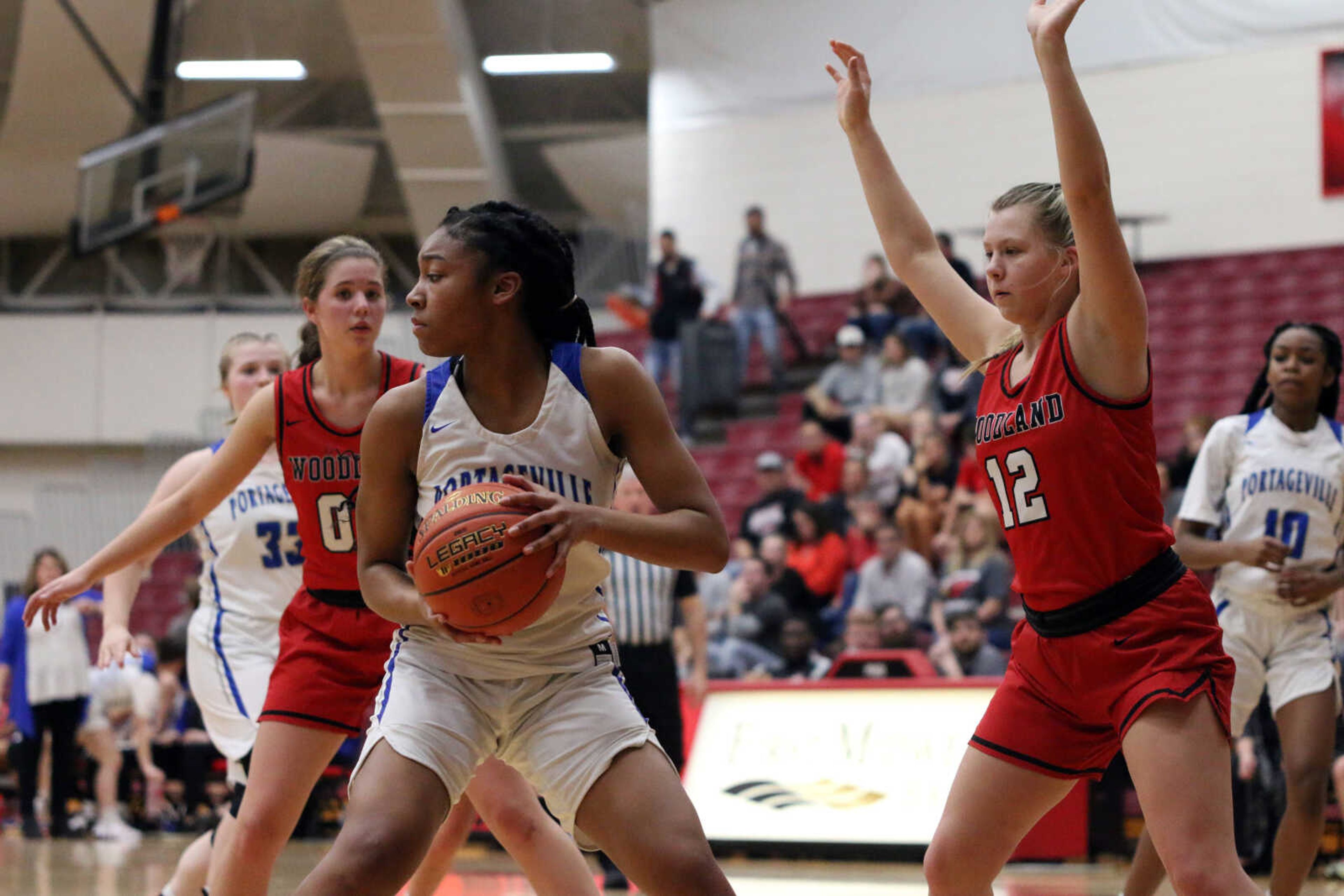 Portageville's Amiyah Saxton (34) works in the paint&nbsp;during a 61-25 win over Woodland in a MSHSAA Class 3 Sectional at the Sikeston Fieldhouse on Monday, Feb. 28. (Dennis Marshall/Standard-Democrat)