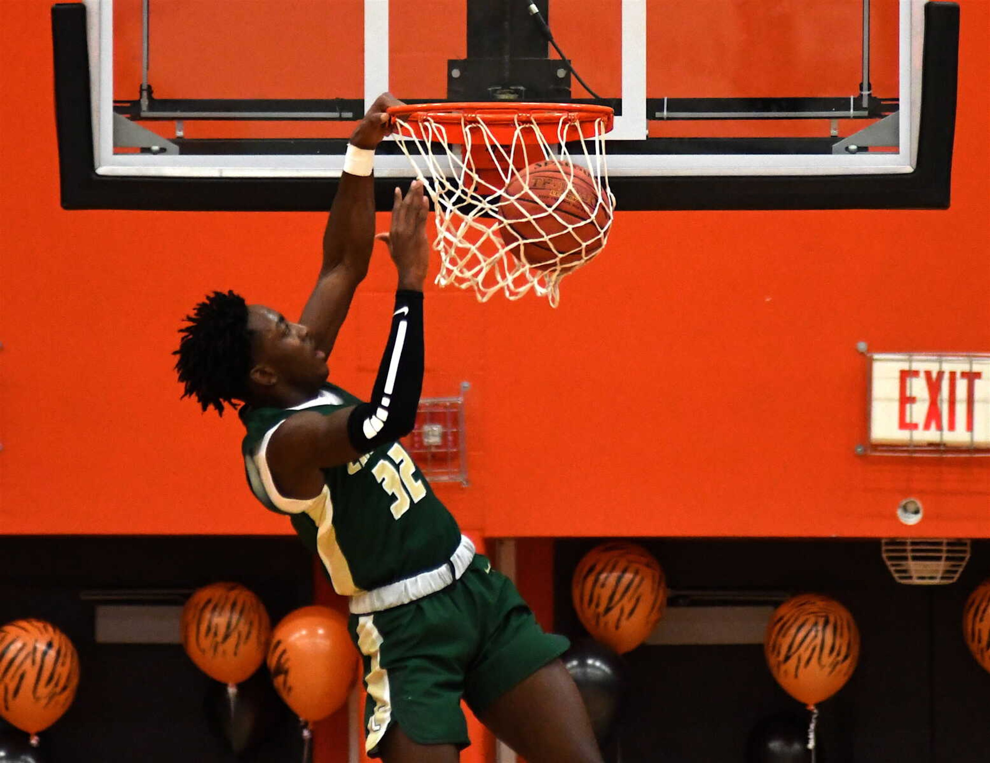 New Madrid County Central's Jadis Jones dunks against Cape Central on Friday in Cape Girardeau.