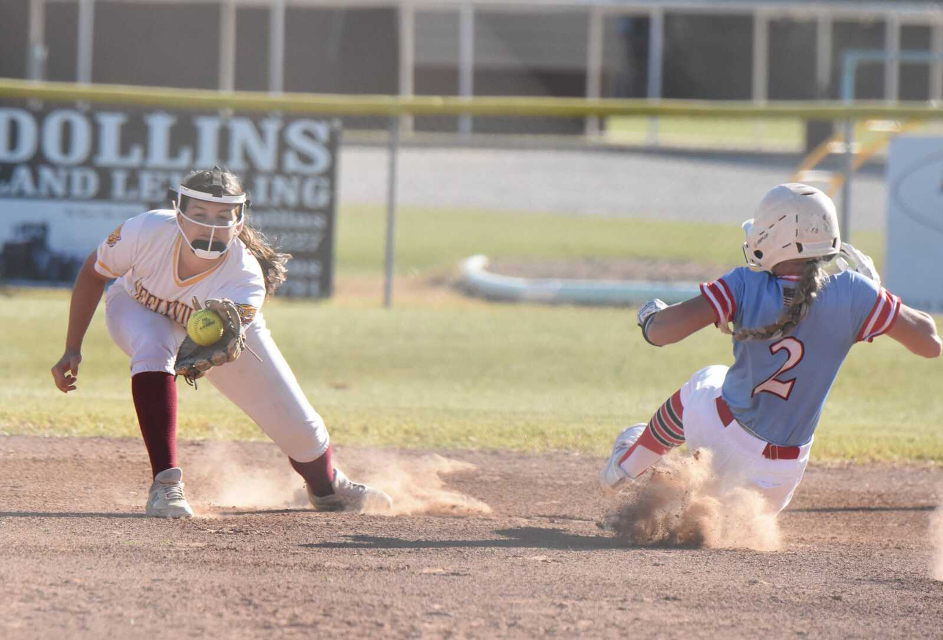 Neelyville shortstop Leah Million receives a throw at second while East Carter's Mykencie Hutchinson slides in on Thursday, Sept. 29, 2022 in Neelyville.