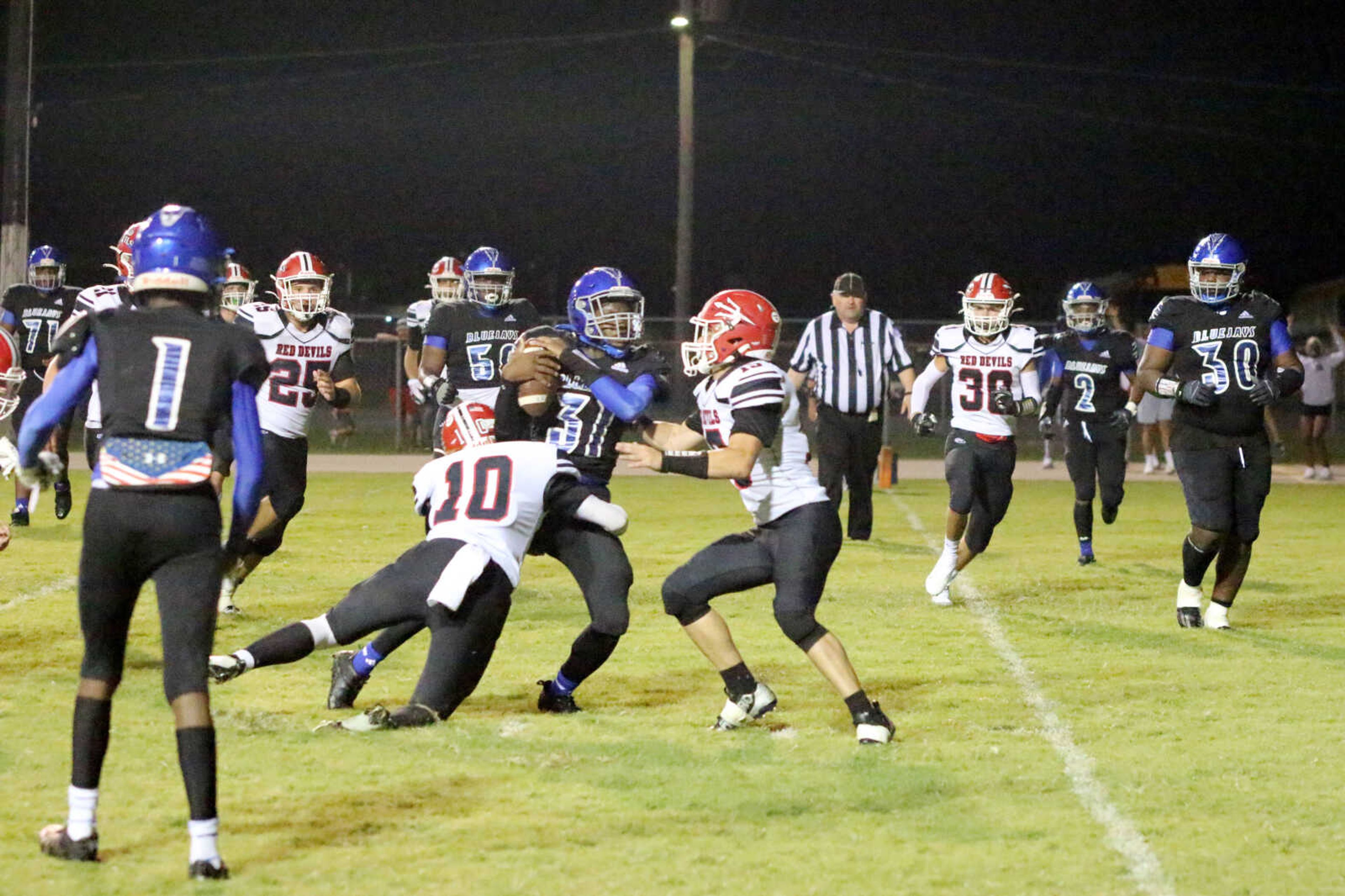 Charleston's Zachyran Thomas (31) runs for a touchdown&nbsp;during a 14-12 loss to Chaffee at John Harris Marshall Stadium on Thursday, August 31, 2023.&nbsp;