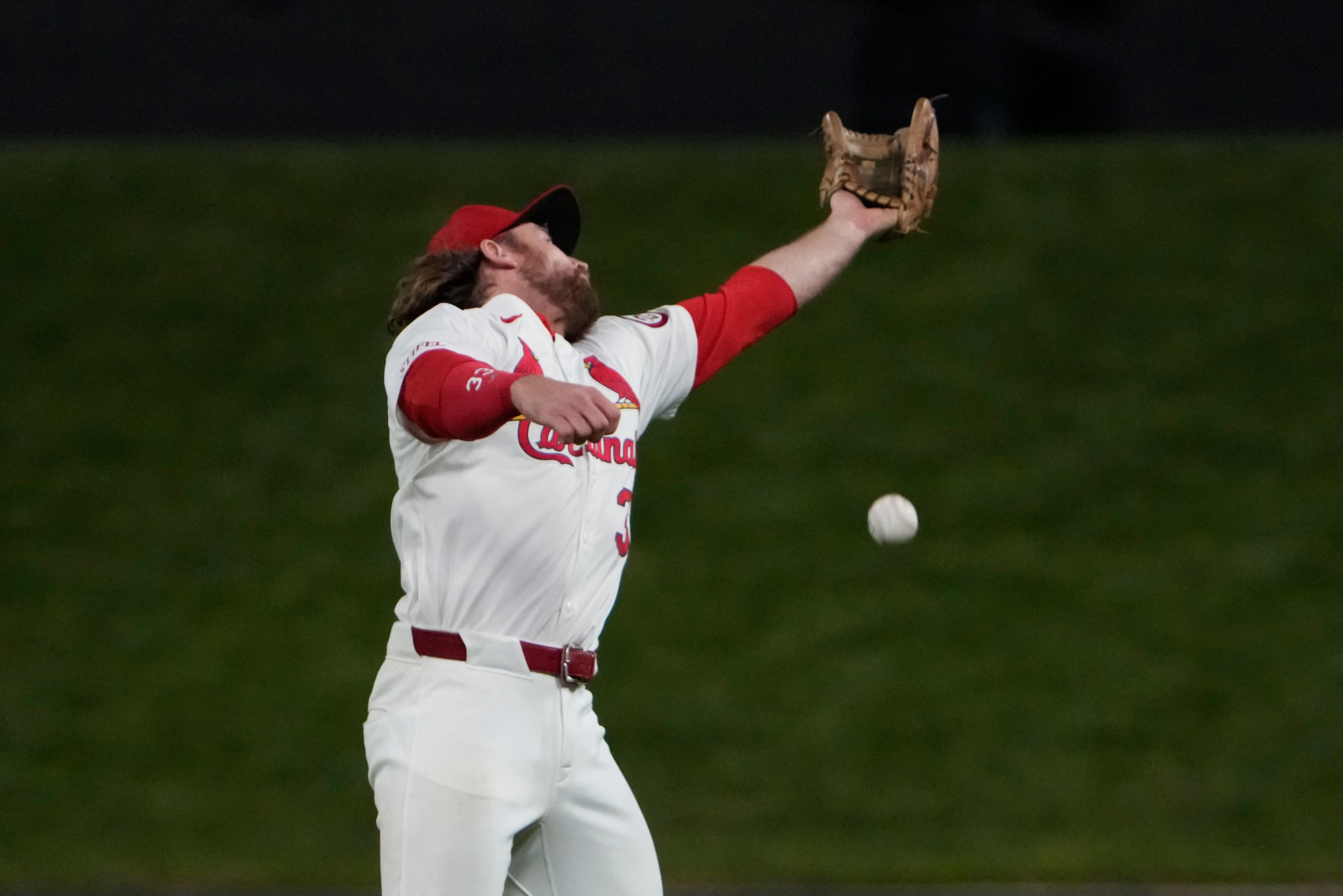 St. Louis Cardinals second baseman Brendan Donovan is unable to catch a single by Seattle Mariners' Julio Rodriguez during the ninth inning of a baseball game Friday, Sept. 6, 2024, in St. Louis. (AP Photo/Jeff Roberson)