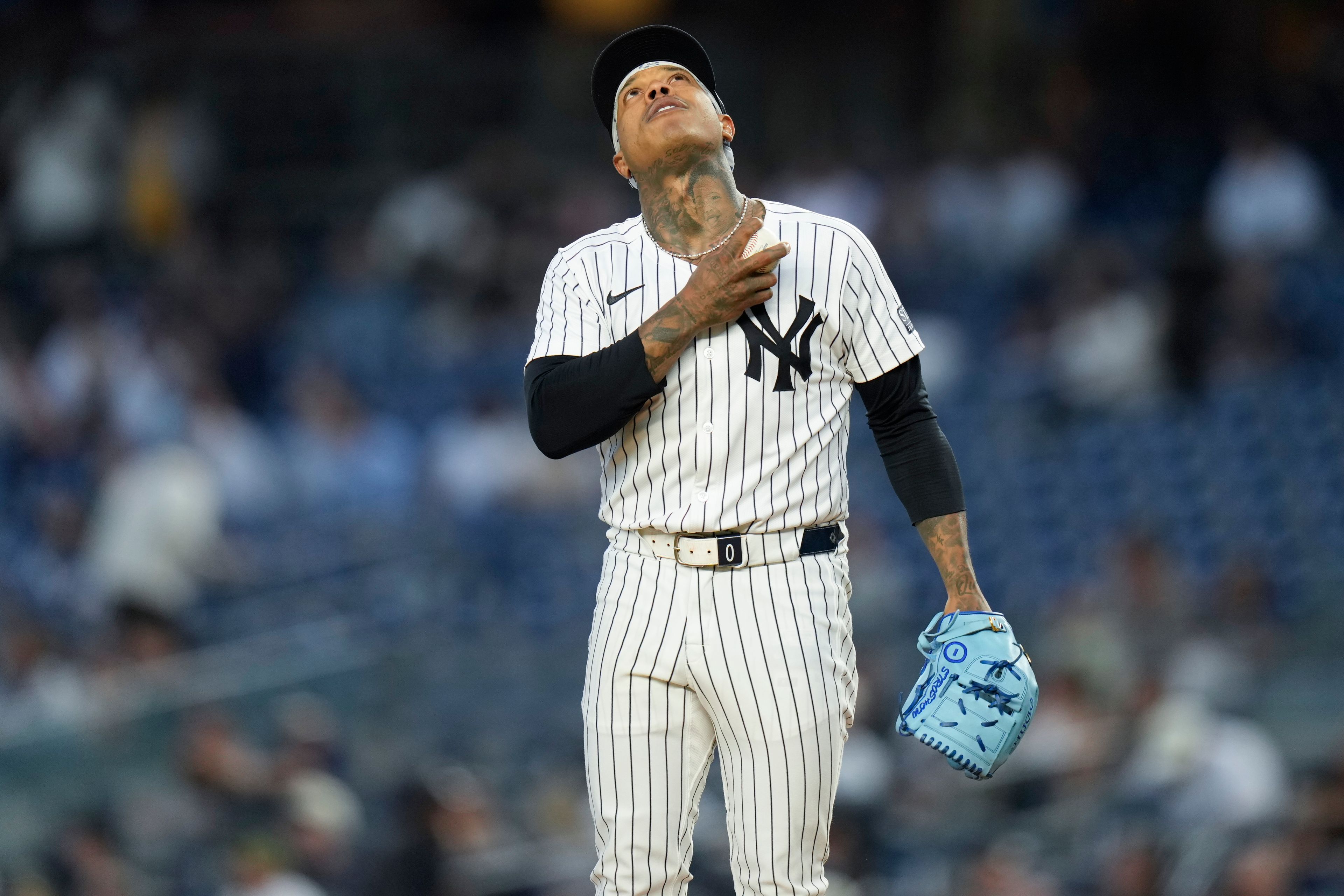 New York Yankees pitcher Marcus Stroman looks up before the start of a baseball game against the Kansas City Royals at Yankee Stadium, Tuesday, Sept. 10, 2024, in New York. (AP Photo/Seth Wenig)