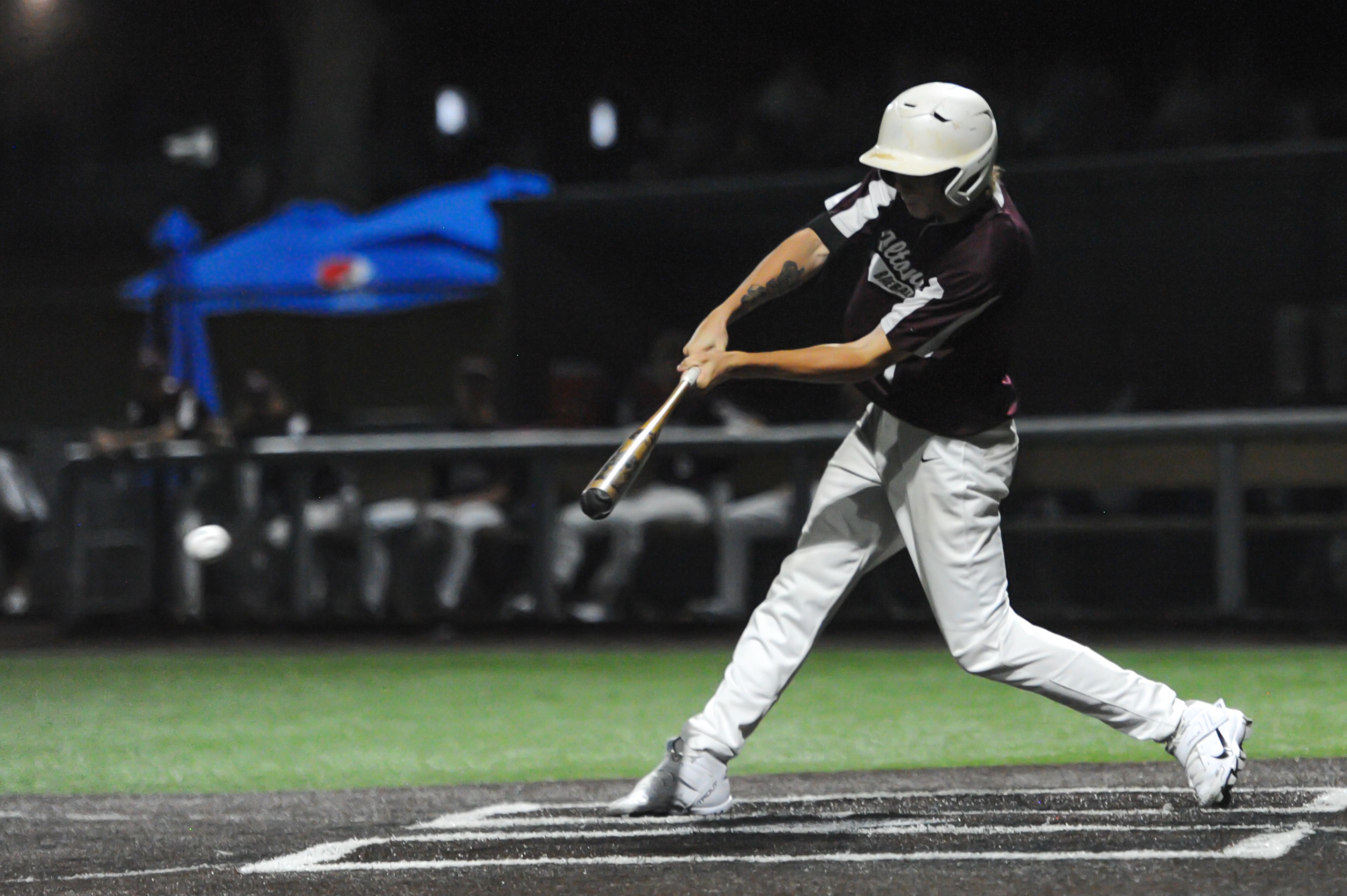 An Altoona player drives a ball for a hit during an August 14, 2024 Babe Ruth World Series game between the Aycorp Fighting Squirrels and the Altoona, Pennsylvania, at Capaha Field in Cape Girardeau, Mo. Aycorp defeated Altoona, 12-11.