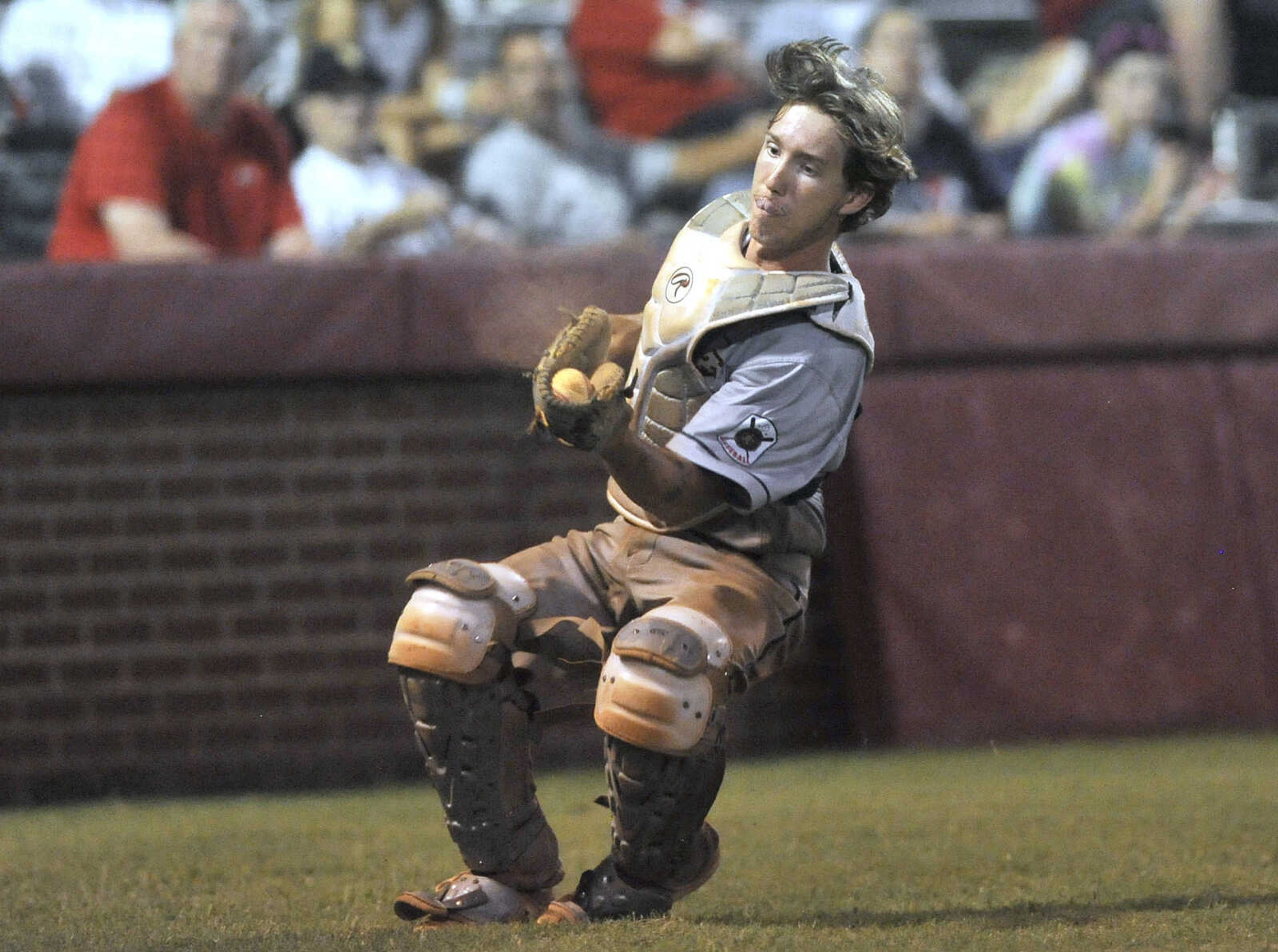 FRED LYNCH ~ flynch@semissourian.com
Cape Girardeau Post 63 catcher Trevor Haas catches a Jackson pop foul during the seventh inning of a semifinal in the Senior Legion District Tournament Friday, July 13, 2018 in Sikeston, Missouri.