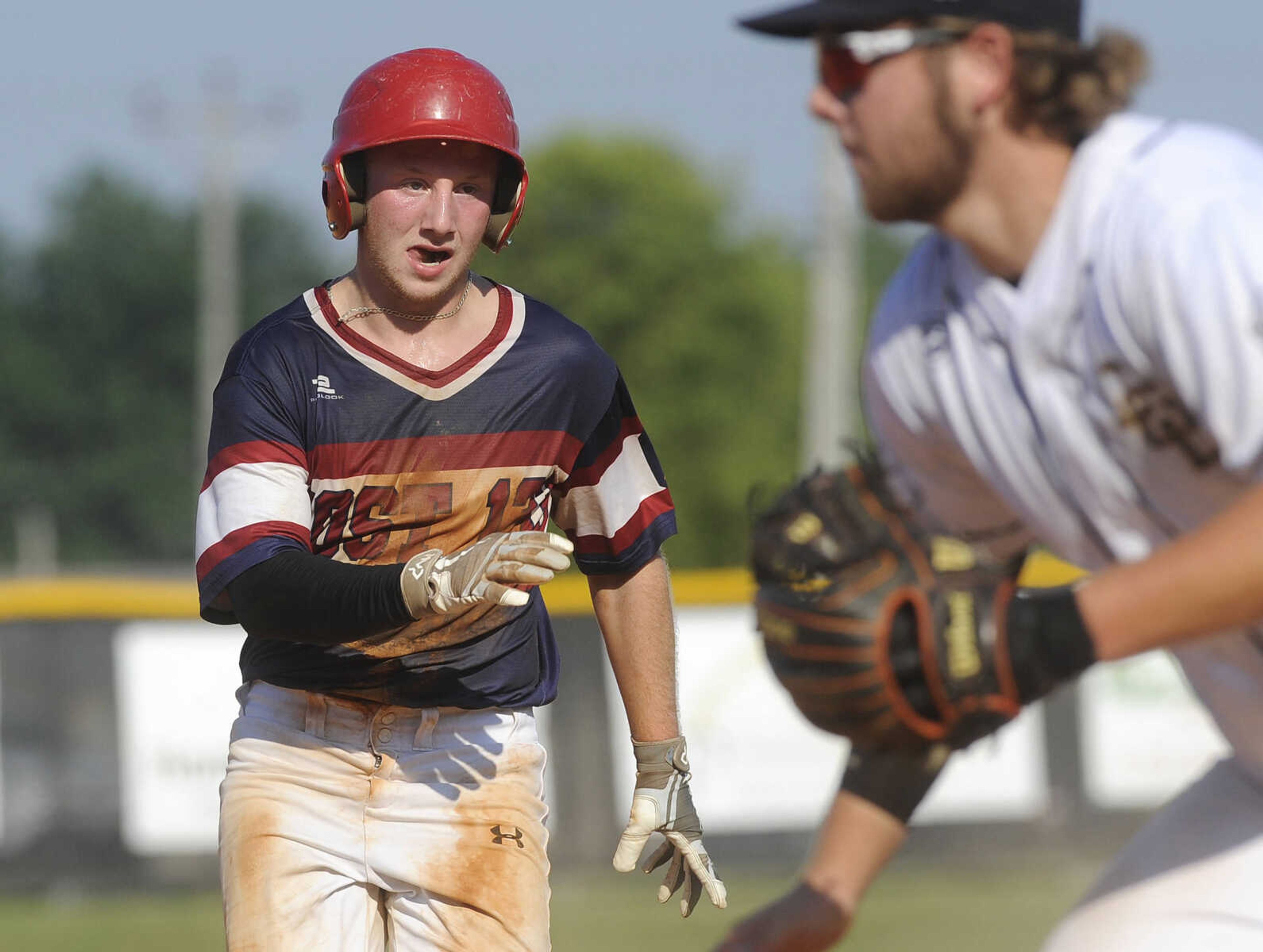 FRED LYNCH ~ flynch@semissourian.com
Perryville Post 133's Parker Miller heads for third base on a hit against Cape Girardeau Post 63 during the third inning of a quarterfinal in the Senior Legion District Tournament Thursday, July 12, 2018 in Sikeston, Missouri.