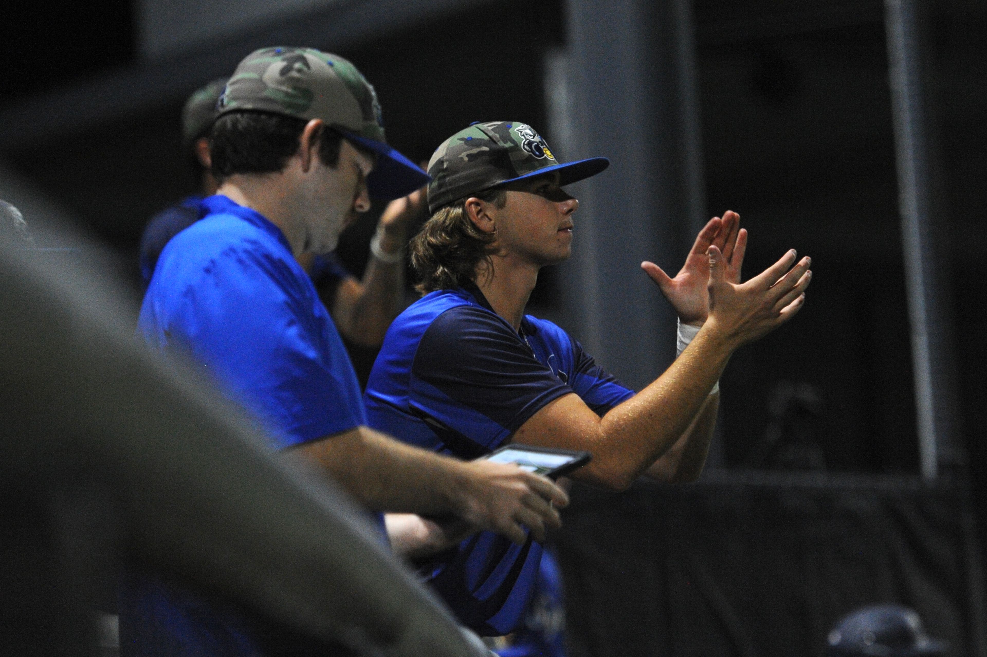 Aycorp's Jack Evans claps to the offense during a Saturday, August 10, 2024 Babe Ruth World Series game between the Aycorp Fighting Squirrels and Manassas, Virginia, at Capaha Field in Cape Girardeau, Mo. Aycorp defeated Manassas, 3-1.