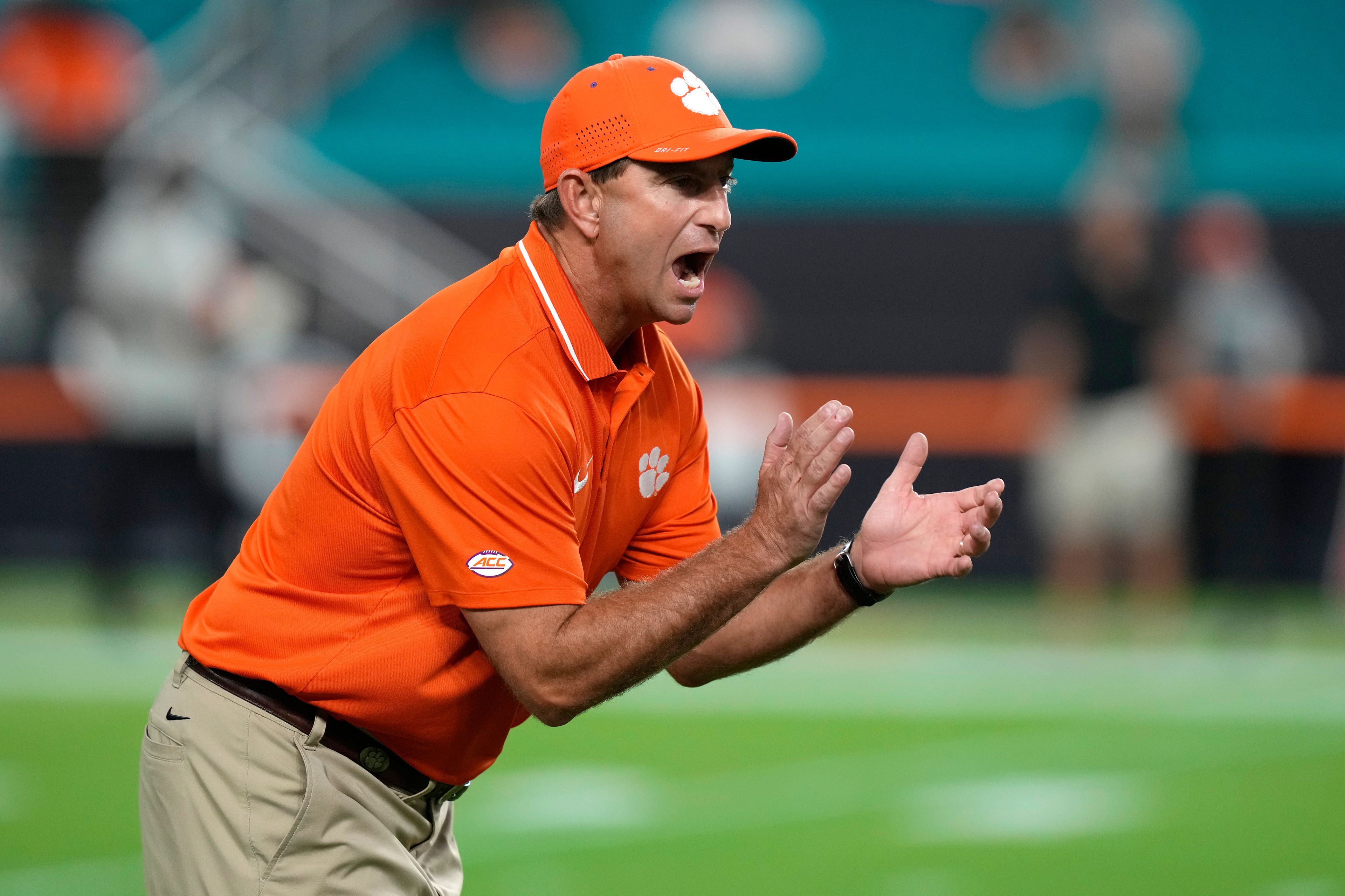 FILE - Clemson head coach Dabo Swinney walks on the field before an NCAA college football game against Miami, Oct. 21, 2023, in Miami Gardens, Fla. (AP Photo/Lynne Sladky, File)