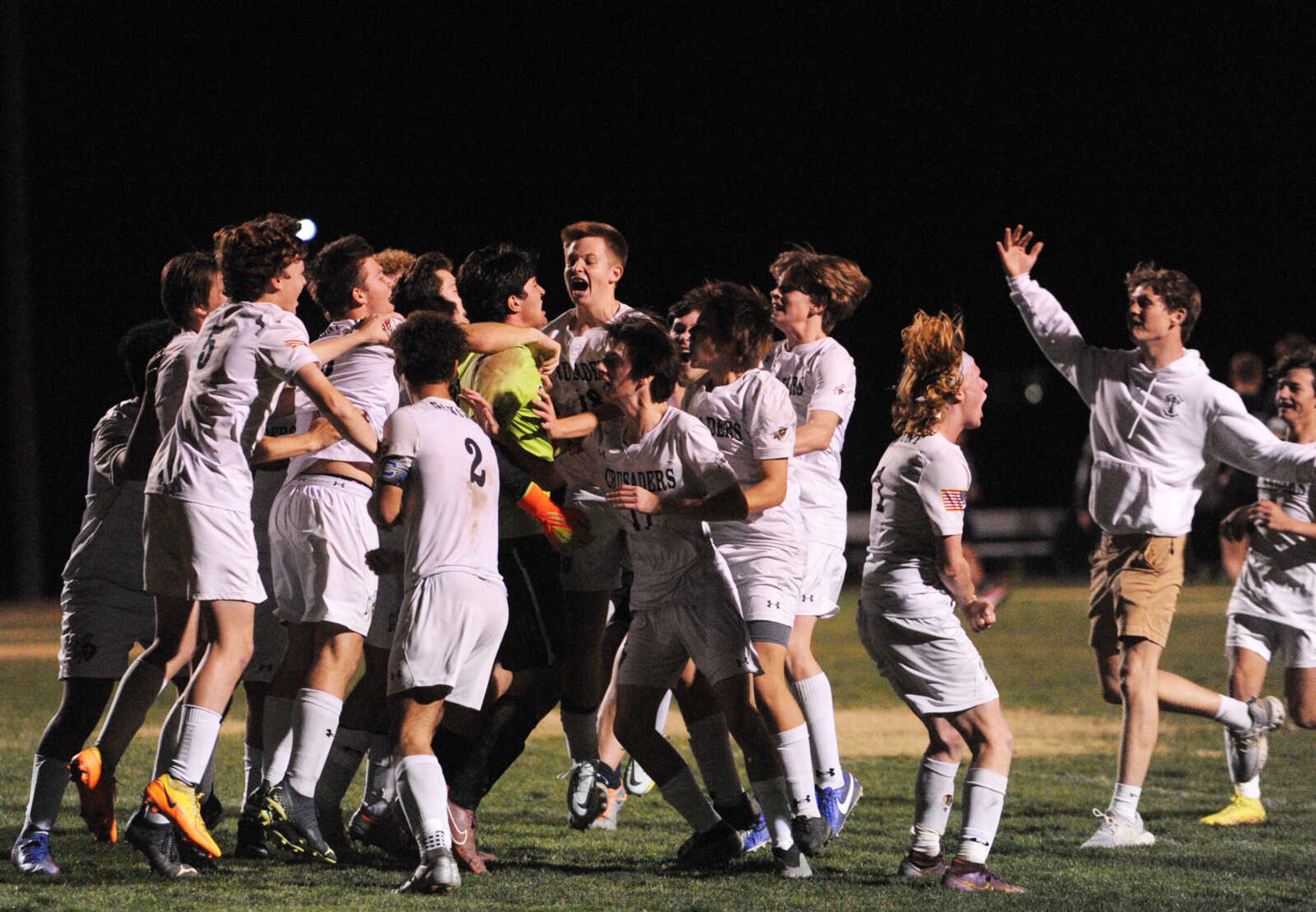 The Saxony Lutheran soccer team celebrates after defeating Affton on Thursday in the Class 2 District 1 championship at The Bank of Missouri Soccer Complex in Perryville.