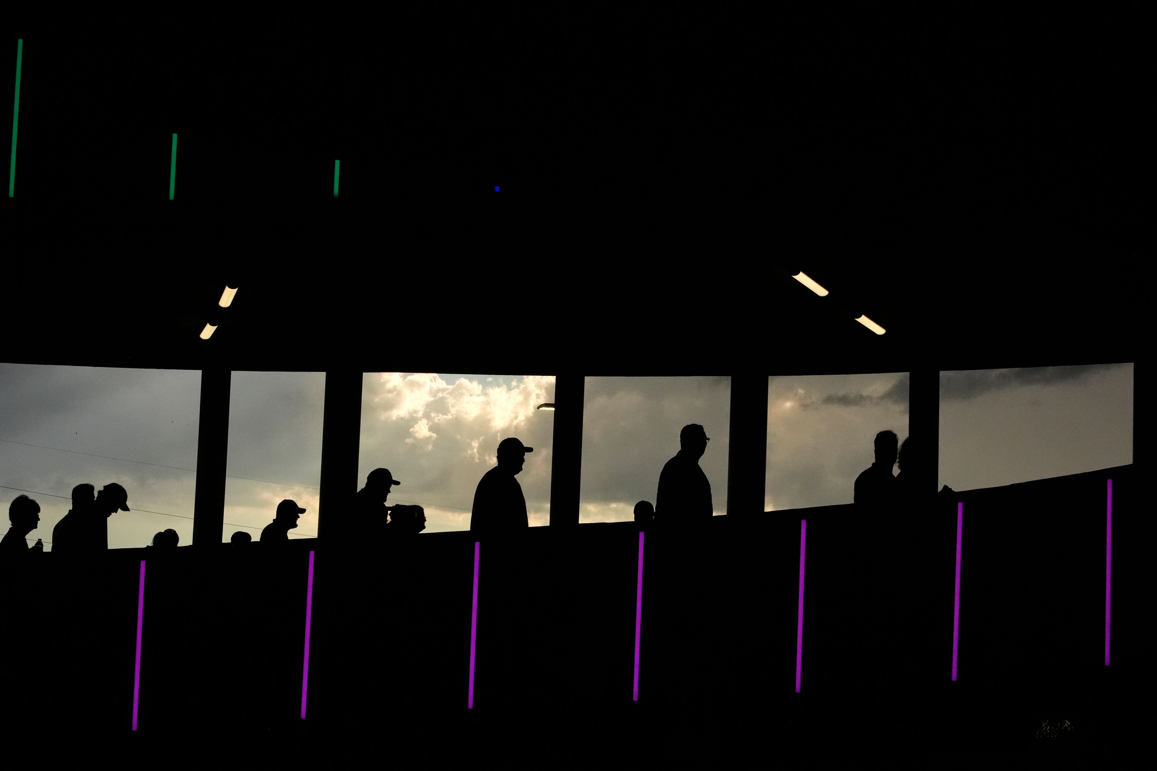 Fans enter Arrowhead Stadium before the start of an NFL football game between the Kansas City Chiefs and the Baltimore Ravens Thursday, Sept. 5, 2024, in Kansas City, Mo. (AP Photo/Charlie Riedel)