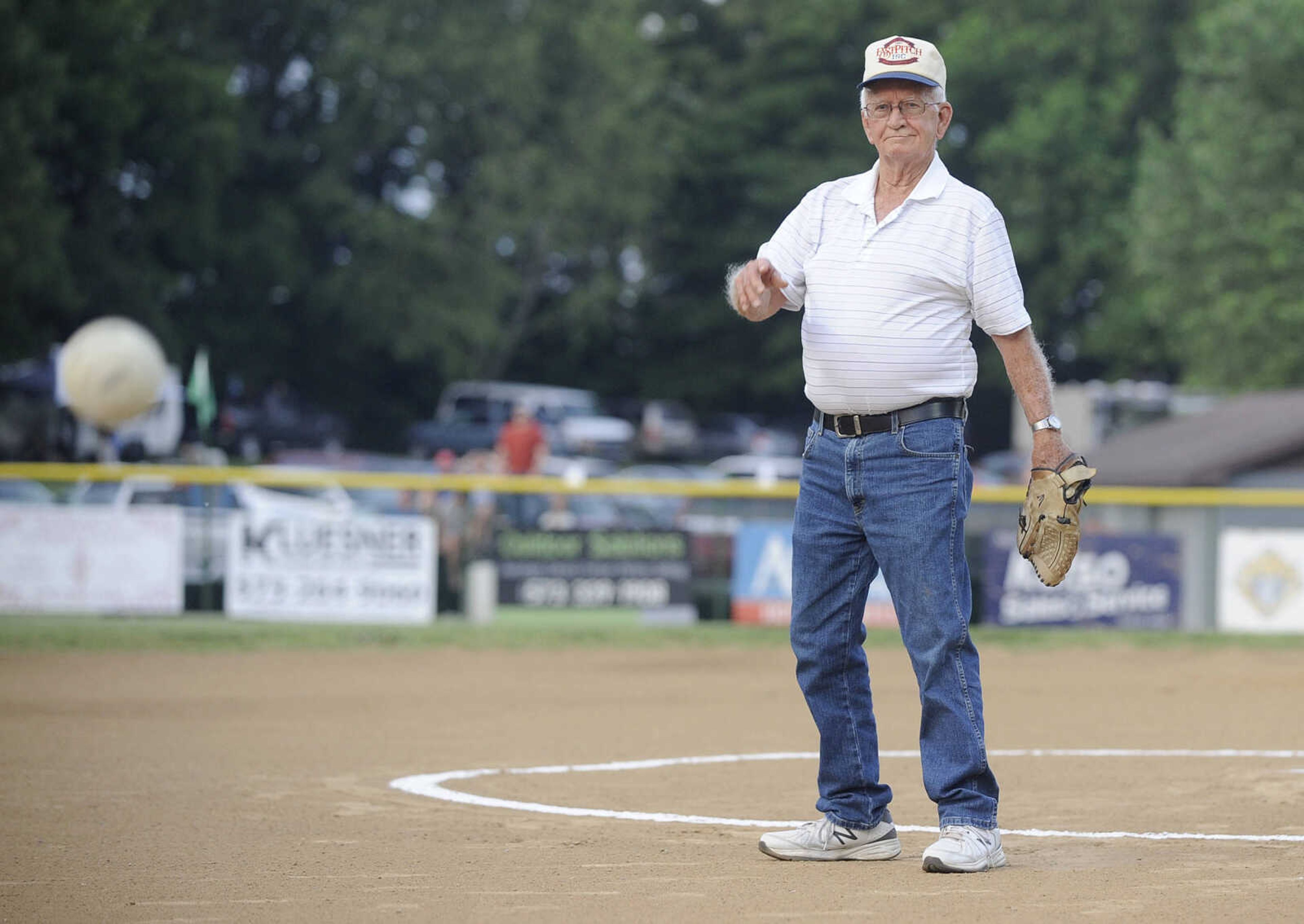 FRED LYNCH ~ flynch@semissourian.com
A.J. Schott throws the ceremonial first pitch Friday night, June 8, 2018 at the Kelso Klassic in Kelso, Missouri. In honoring Schott, it was noted that in 1979 as mayor of Kelso, he acquired the grant to help fund the Kelso Ball Park.